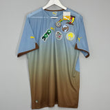 Shop 2010/11 AFRICA UNITY *BNWT* THIRD SHIRT (XL) PUMA, classic football shirts, vintage football shirts & retro soccer jerseys at Cult Kits
