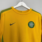 Shop 2010/11 CELTIC TRAINING SHIRT (L) NIKE, classic football shirts, vintage football shirts & retro soccer jerseys at Cult Kits