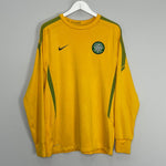 Shop 2010/11 CELTIC TRAINING SHIRT (L) NIKE, classic football shirts, vintage football shirts & retro soccer jerseys at Cult Kits