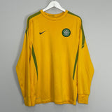 Shop 2010/11 CELTIC TRAINING SHIRT (L) NIKE, classic football shirts, vintage football shirts & retro soccer jerseys at Cult Kits