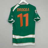 Shop 2010/11 IVORY COAST DROGBA #11 AWAY SHIRT (M) PUMA, classic football shirts, vintage football shirts & retro soccer jerseys at Cult Kits