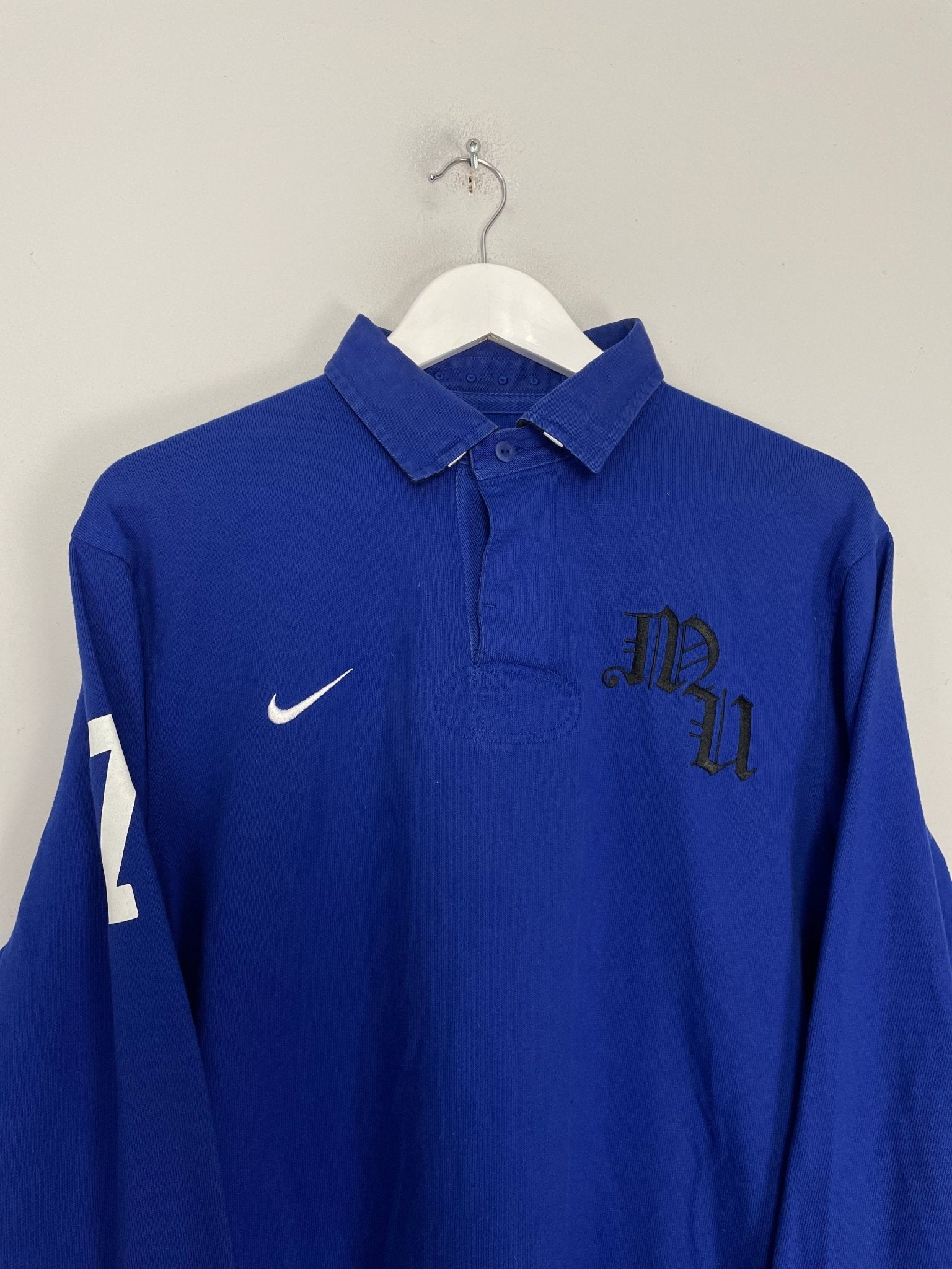 Shop 2010/11 MANCHESTER UNITED RUGBY SHIRT (L) NIKE, classic football shirts, vintage football shirts & retro soccer jerseys at Cult Kits