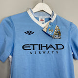 Shop 2011/12 MANCHESTER CITY *BNWT* HOME SHIRT (L.KIDS) UMBRO, classic football shirts, vintage football shirts & retro soccer jerseys at Cult Kits