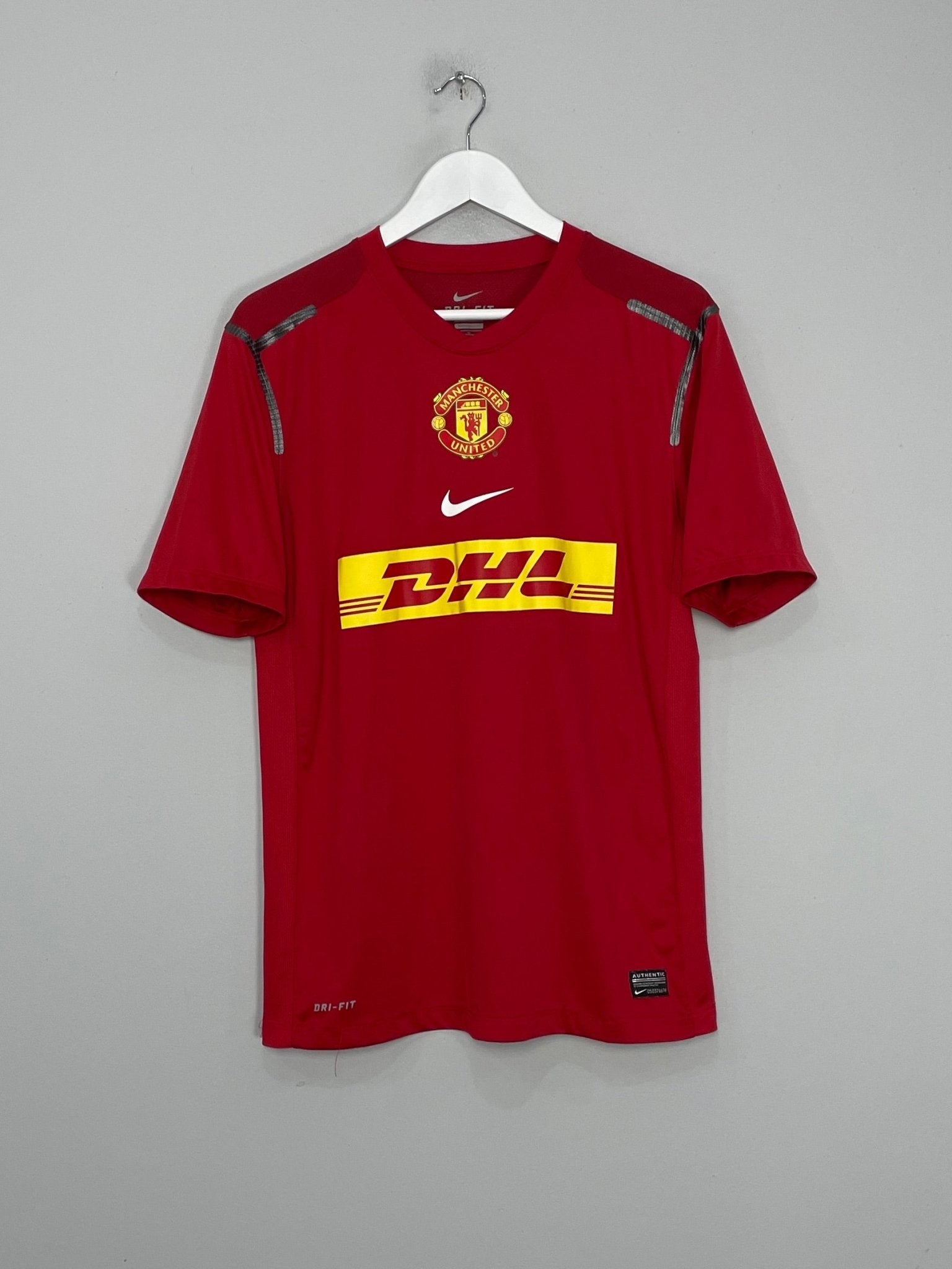 Shop 2012/13 MANCHESTER UNITED TRAINING SHIRT (M) NIKE, classic football shirts, vintage football shirts & retro soccer jerseys at Cult Kits