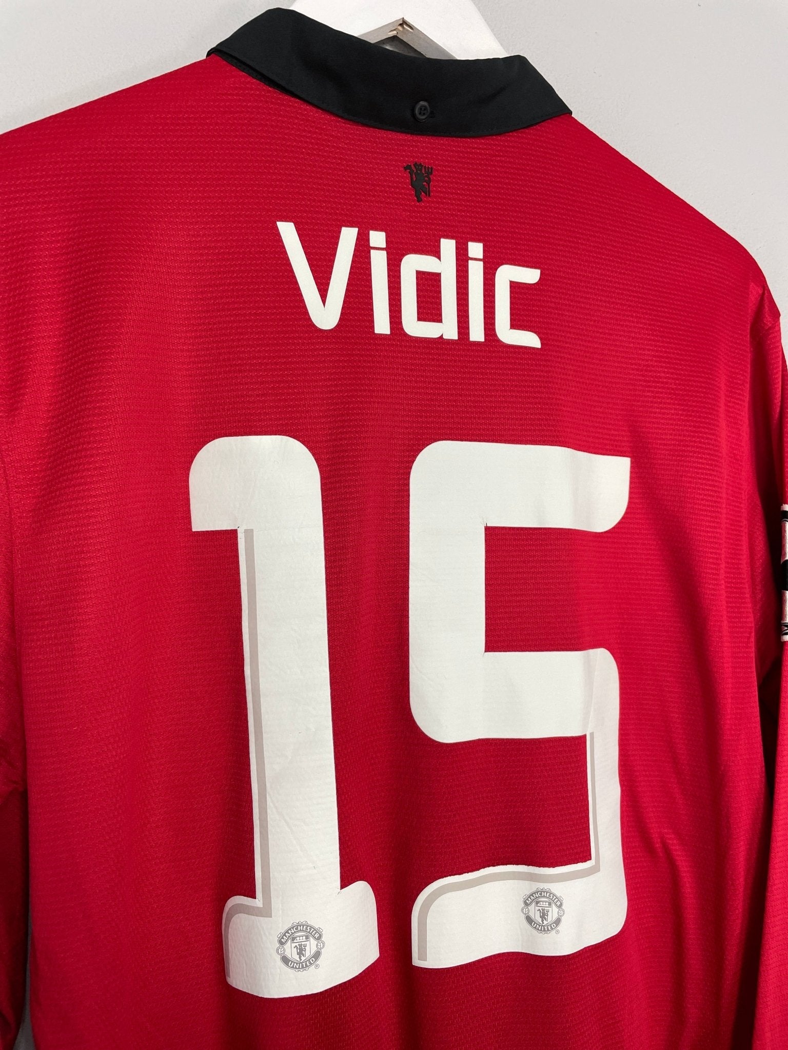 Shop 2013/14 MANCHESTER UNITED VIDIC #15 L/S C/L HOME SHIRT (L) NIKE, classic football shirts, vintage football shirts & retro soccer jerseys at Cult Kits