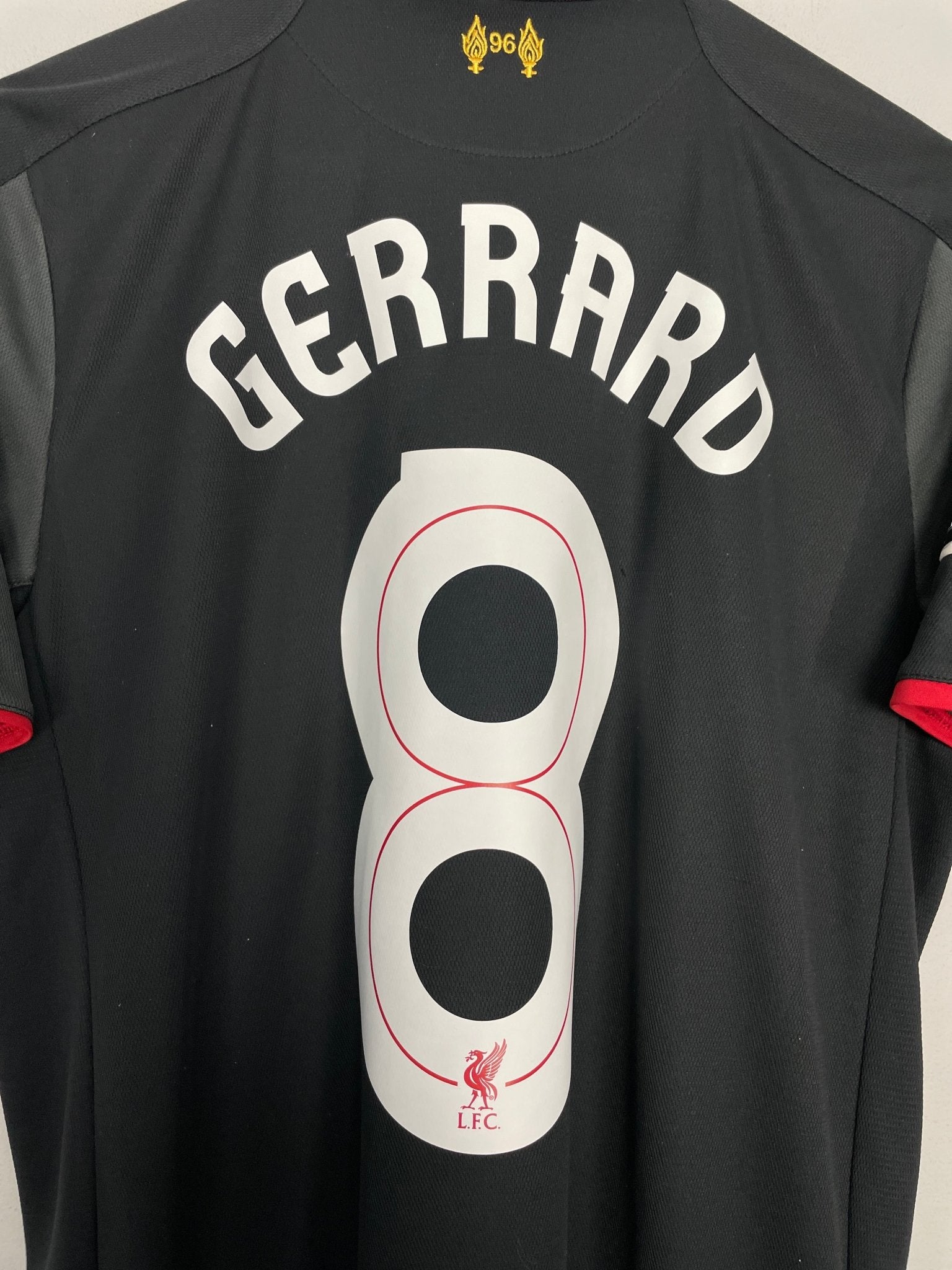 Shop 2014/15 LIVERPOOL GERRARD #8 C/L THIRD SHIRT (M) WARRIOR, classic football shirts, vintage football shirts & retro soccer jerseys at Cult Kits