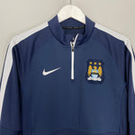 Shop 2014/15 MANCHESTER CITY 1/4 ZIP (S) NIKE, classic football shirts, vintage football shirts & retro soccer jerseys at Cult Kits