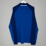 Shop 2021/22 RANGERS 1/4 ZIP DRILL TOP (XXL) CASTORE, classic football shirts, vintage football shirts & retro soccer jerseys at Cult Kits