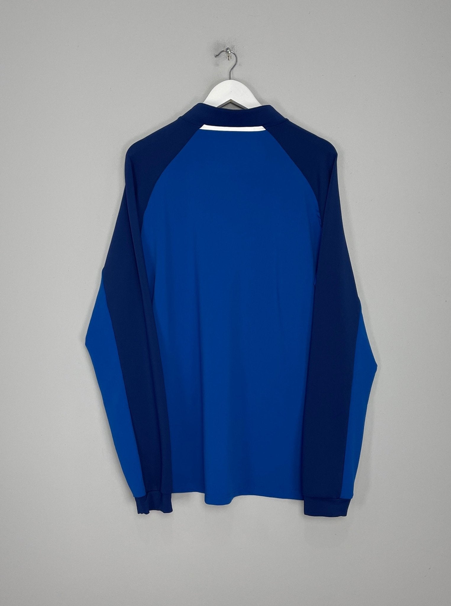 Shop 2021/22 RANGERS 1/4 ZIP DRILL TOP (XXL) CASTORE, classic football shirts, vintage football shirts & retro soccer jerseys at Cult Kits