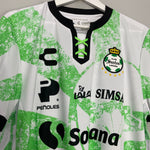 Shop 2021/22 SANTOS LAGUNA *BNWT* LUCHO LIBRA SPECIAL EDITION SHIRT (L) CHARLY, classic football shirts, vintage football shirts & retro soccer jerseys at Cult Kits
