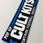 Shop DOUBLE ZINDAMAGE CULT KITS HONG KONG POP-UP SCARF, classic football shirts, vintage football shirts & retro soccer jerseys at Cult Kits