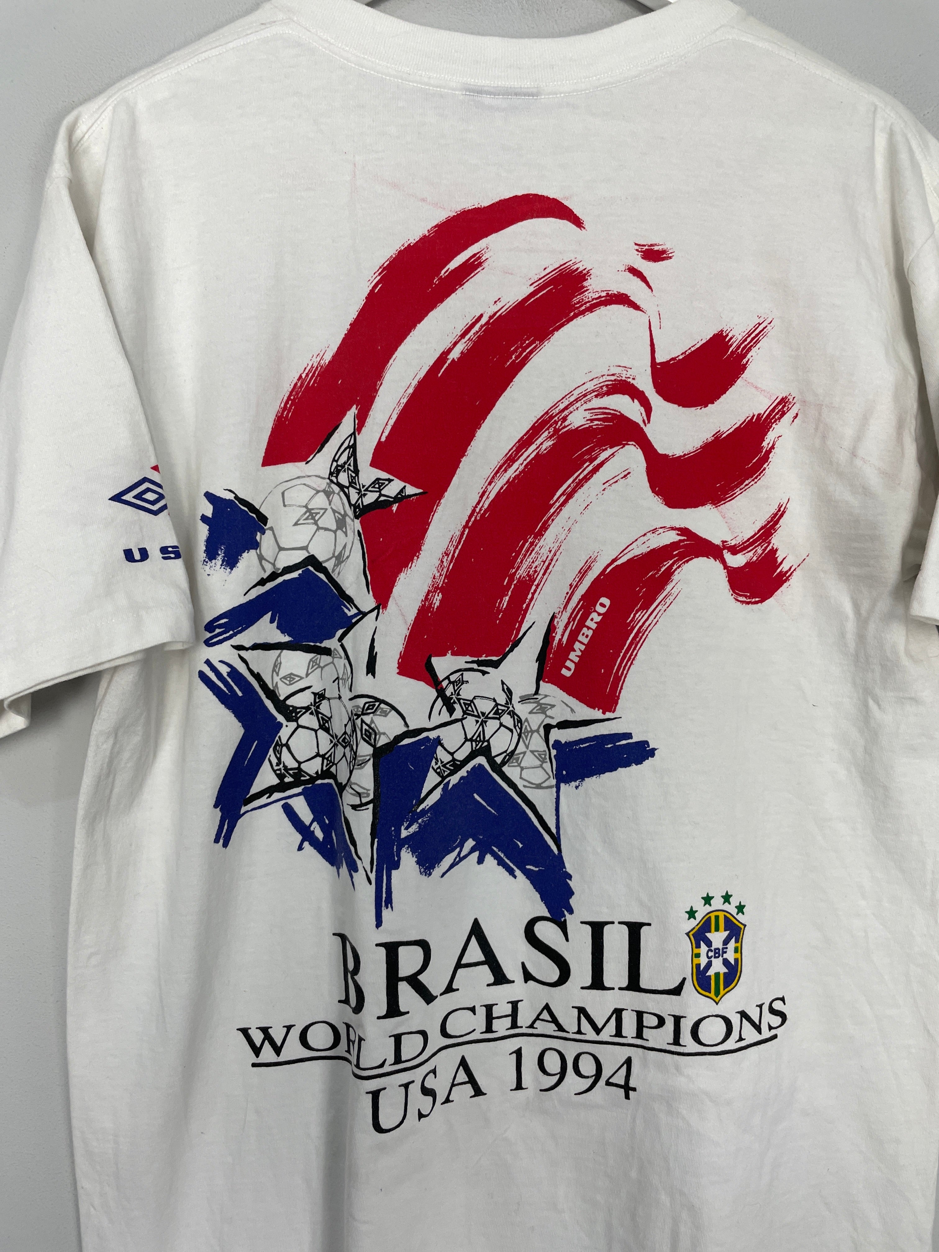 Shop 1994 USA WORLD CUP BRAZIL CHAMPIONS T-SHIRT (L) UMBRO, classic football shirts, vintage football shirts & retro soccer jerseys at Cult Kits
