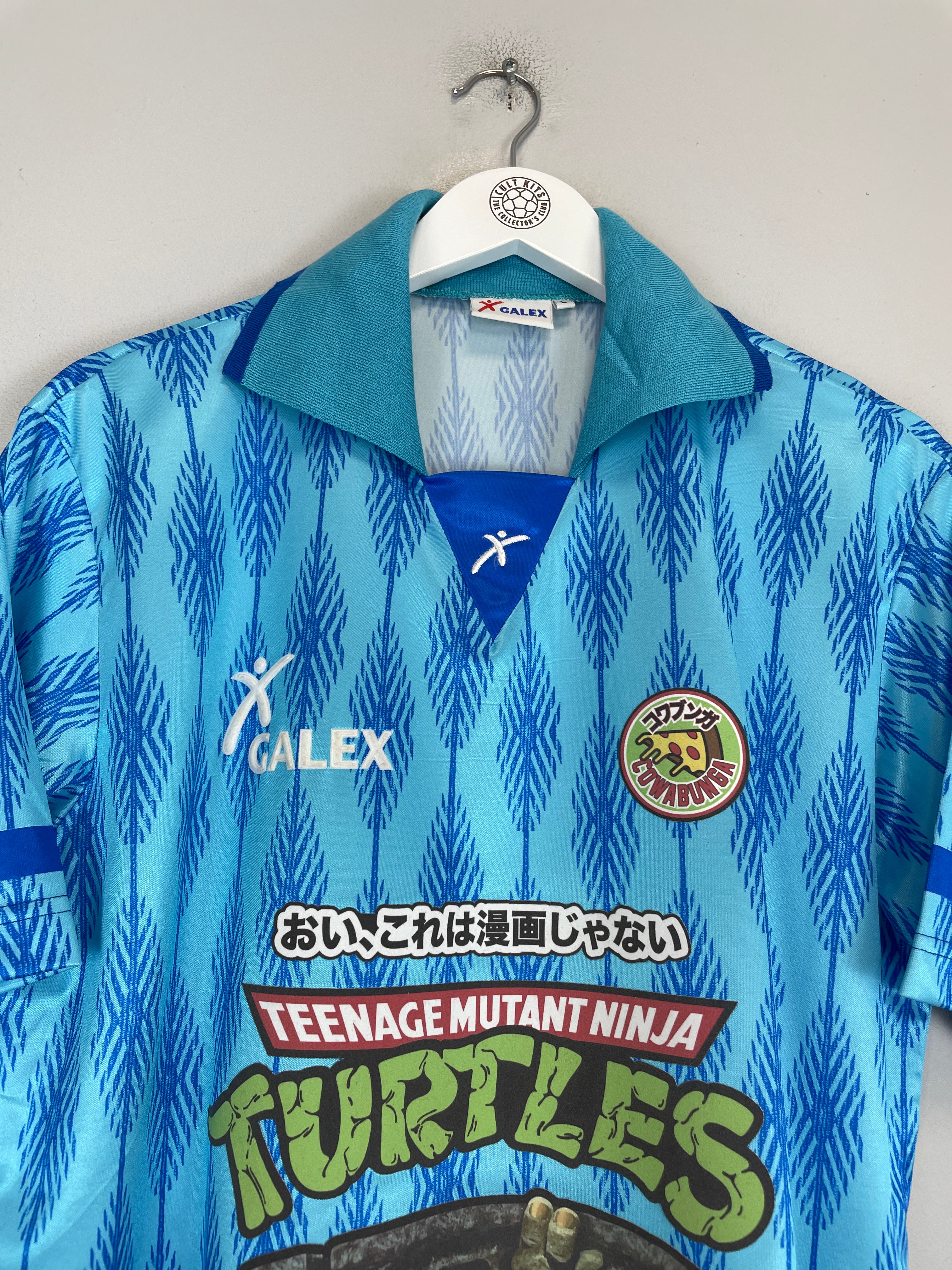 Shop 1998/99 NINJA TURTLES X JAPANESE MOVIE MASHUP #7 SHIRT (L) GALEX, classic football shirts, vintage football shirts & retro soccer jerseys at Cult Kits