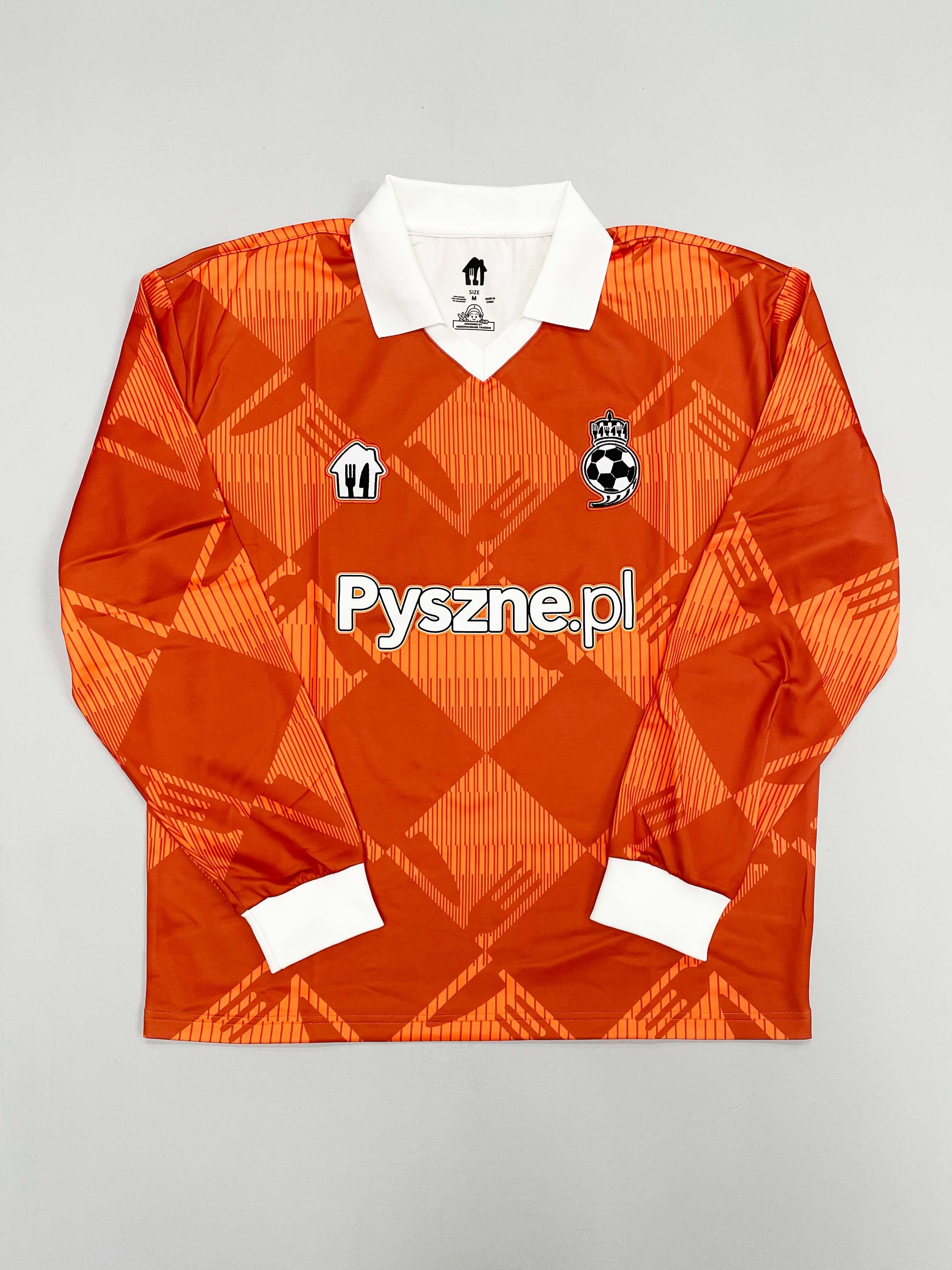 2024/25 Pyszne.pl Cult Kits football jersey in orange with diamond pattern, featuring logo and collar, available in multiple sizes.