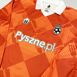 2024/25 Pyszne.pl Cult Kits Football Jersey in orange, featuring a sleek design and brand new condition, perfect for football fans.