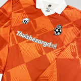 2024/25 Thuisbezorgd.nl Cult Kits football jersey in orange, featuring bold geometric design and club logo, perfect for fans.
