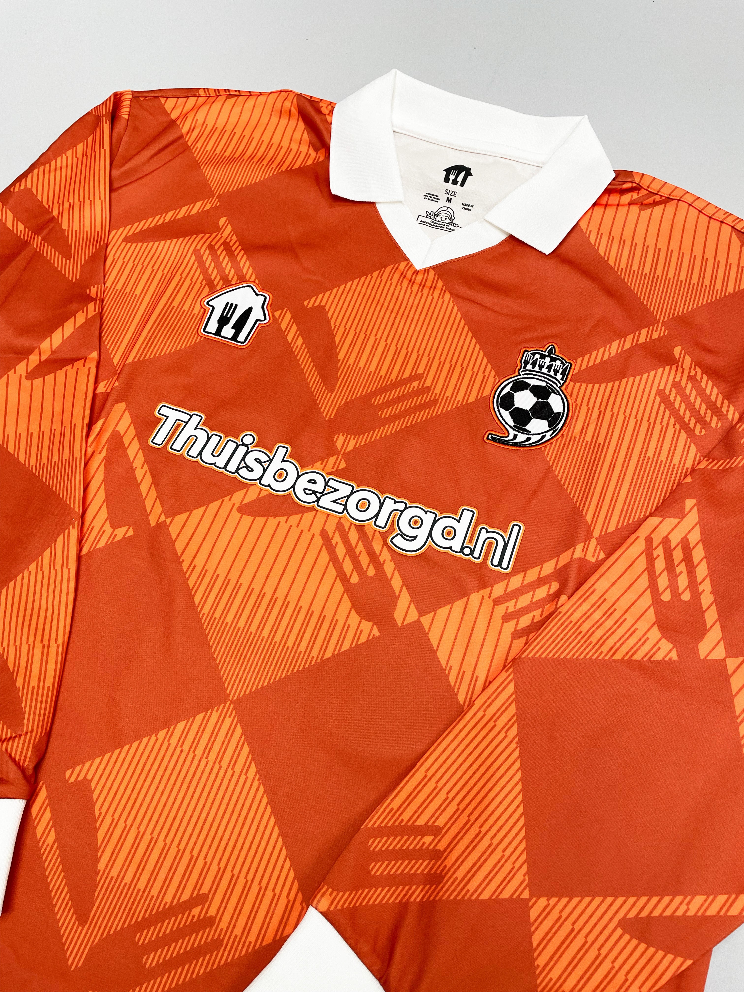 2024/25 Thuisbezorgd.nl Cult Kits football jersey in orange, featuring bold geometric design and club logo, perfect for fans.