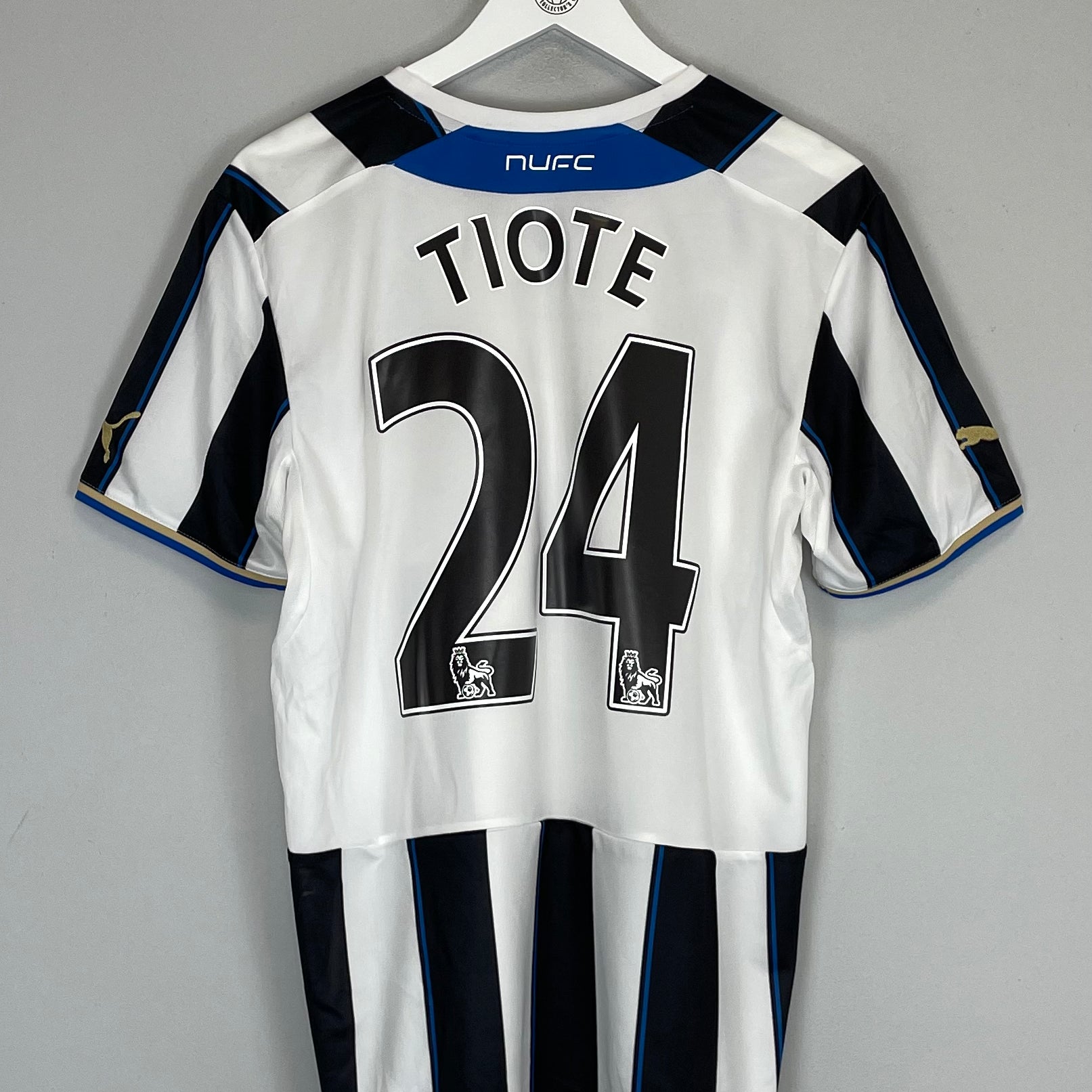 Shop 2013/14 NEWCASTLE TIOTE #24 HOME SHIRT (M) PUMA, classic football shirts, vintage football shirts & retro soccer jerseys at Cult Kits