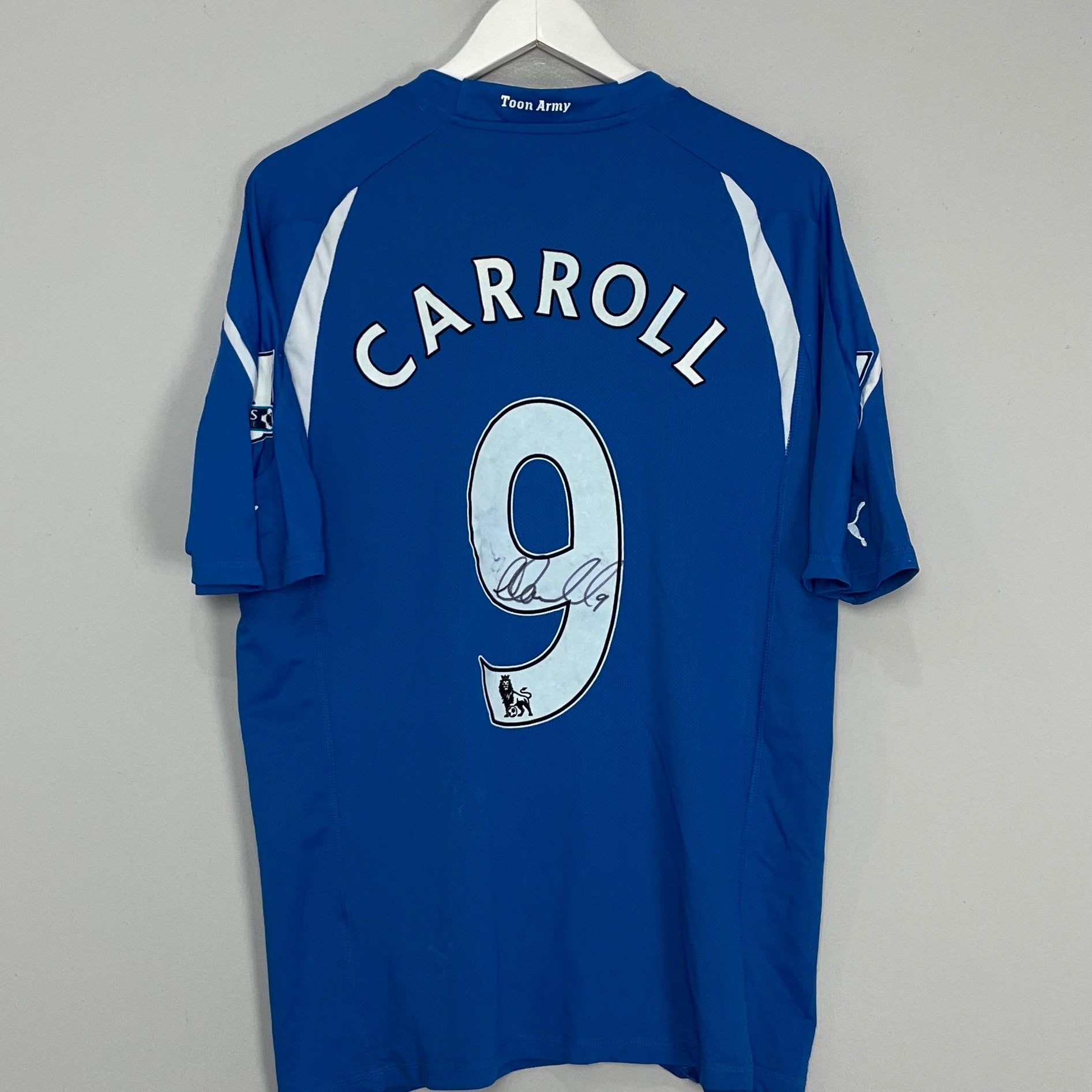 Shop 2010/11 NEWCASTLE CARROLL #9 *MATCH ISSUED + SIGNED* AWAY SHIRT (XL) PUMA, classic football shirts, vintage football shirts & retro soccer jerseys at Cult Kits
