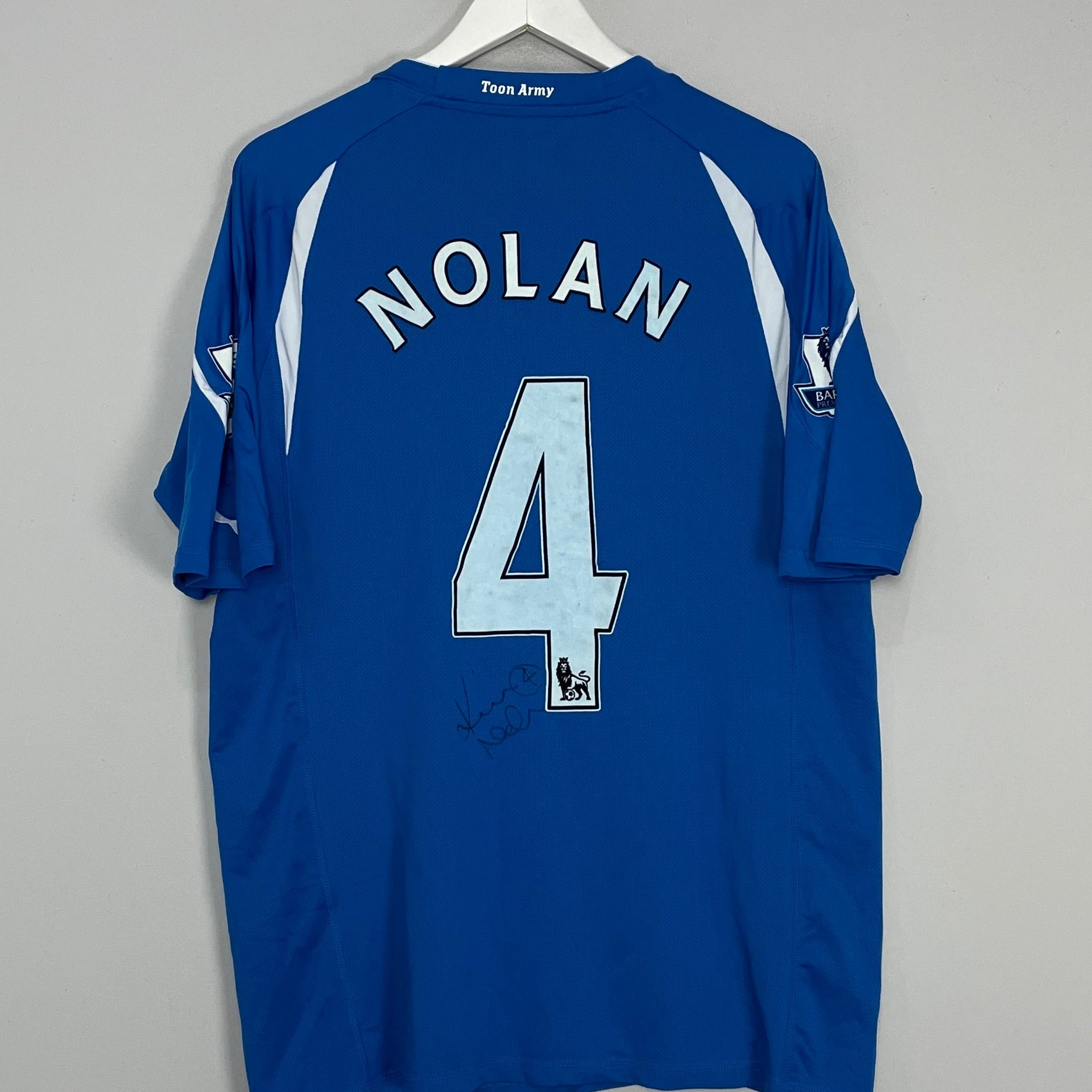 Shop 2010/11 NEWCASTLE NOLAN #4 *MATCH ISSUED + SIGNED* AWAY SHIRT (XL) PUMA, classic football shirts, vintage football shirts & retro soccer jerseys at Cult Kits