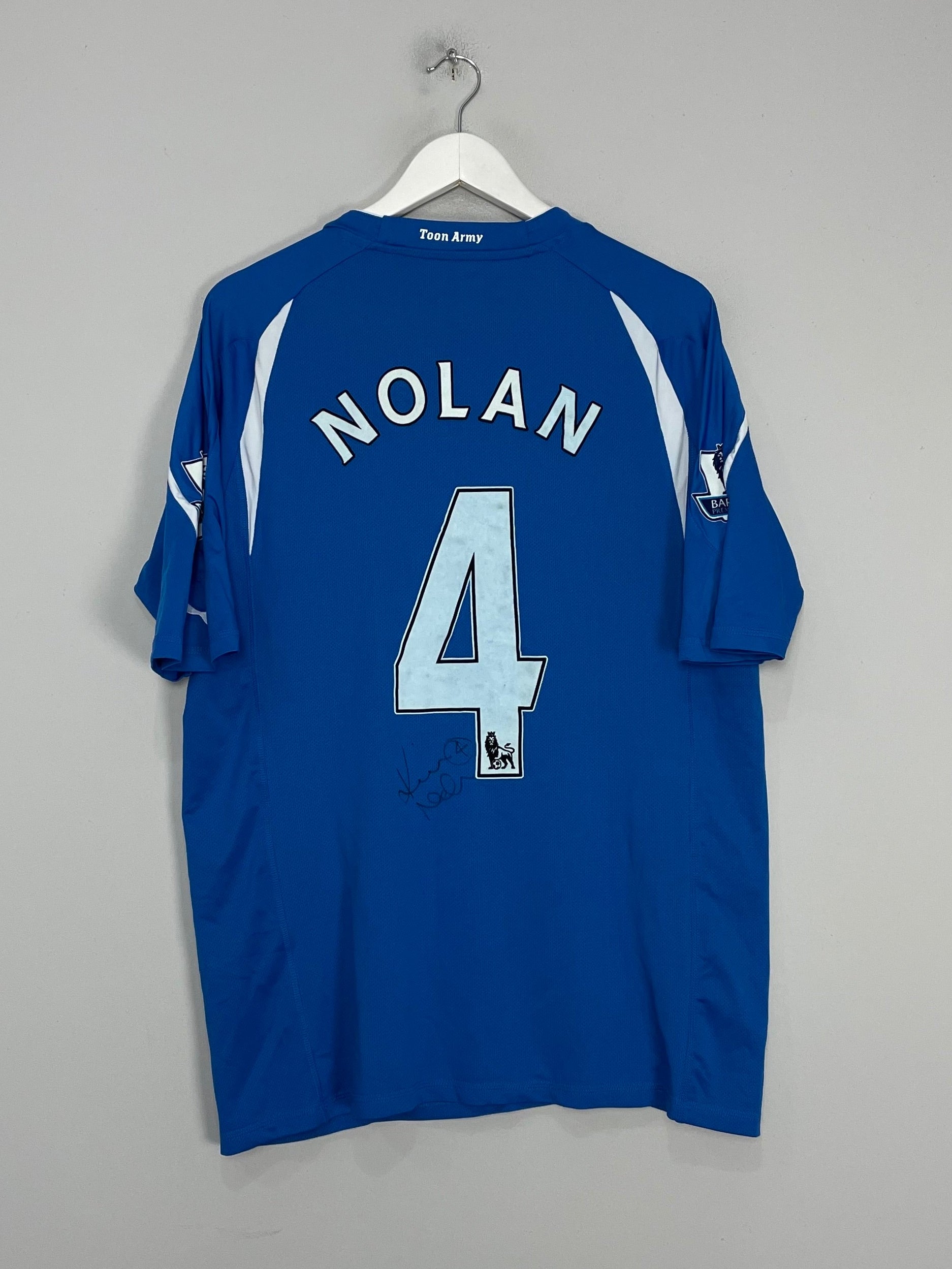 Shop 2010/11 NEWCASTLE NOLAN #4 *MATCH ISSUED + SIGNED* AWAY SHIRT (XL) PUMA, classic football shirts, vintage football shirts & retro soccer jerseys at Cult Kits