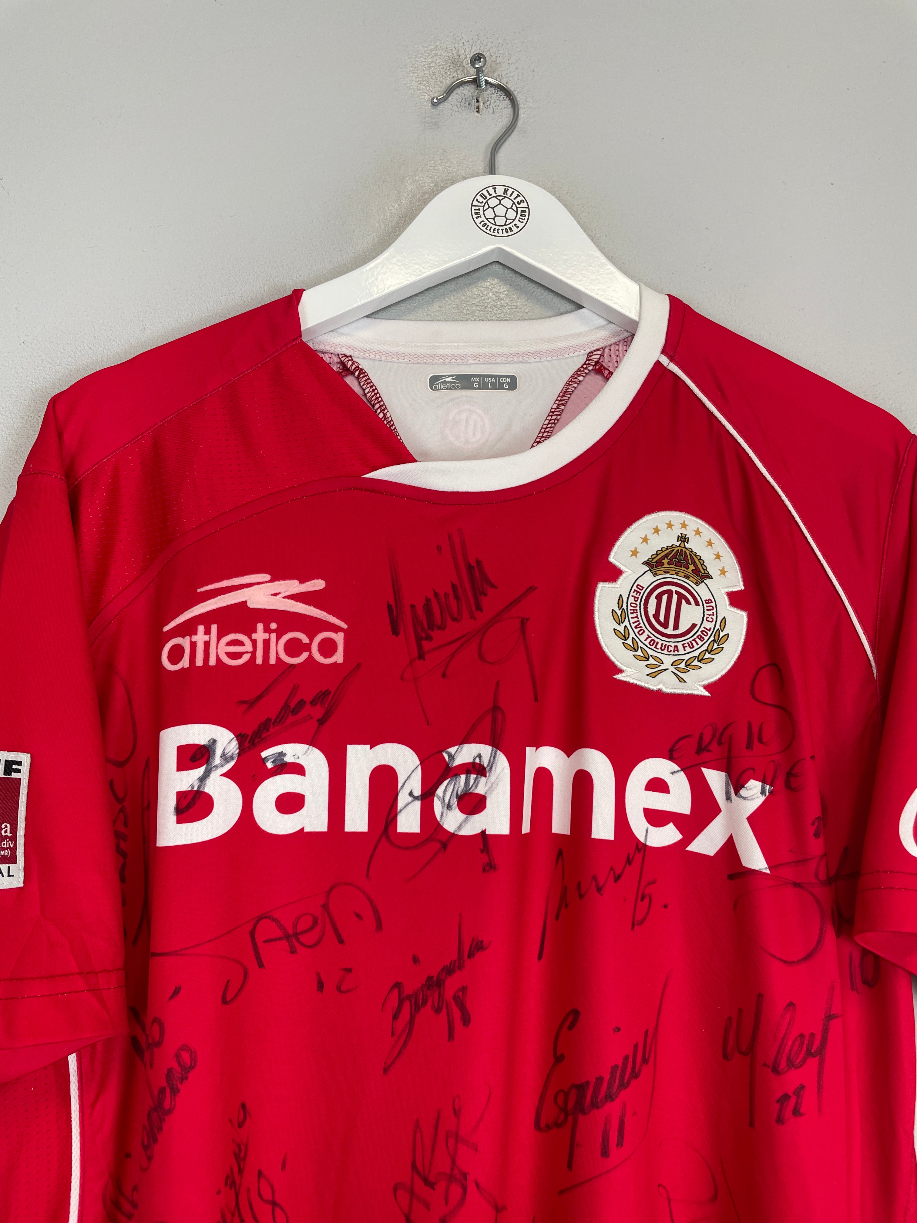 Shop 2009/10 TOLUCA *SQUAD SIGNED* BNWT HOME SHIRT (L) ATLETICA, classic football shirts, vintage football shirts & retro soccer jerseys at Cult Kits