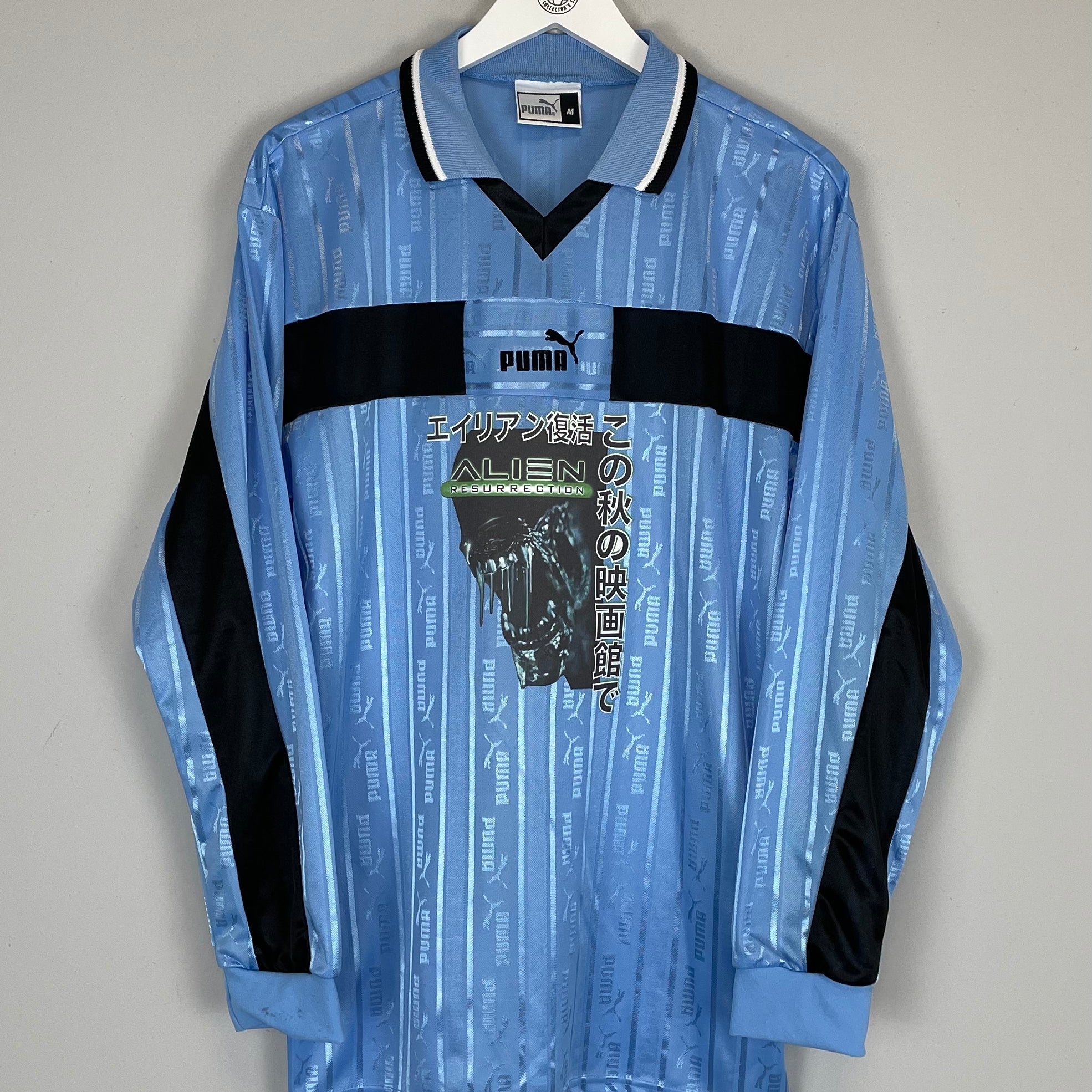 Shop 1999 ALIEN X JAPANSESE MOVIE MASHUP SHIRT (M) PUMA, classic football shirts, vintage football shirts & retro soccer jerseys at Cult Kits