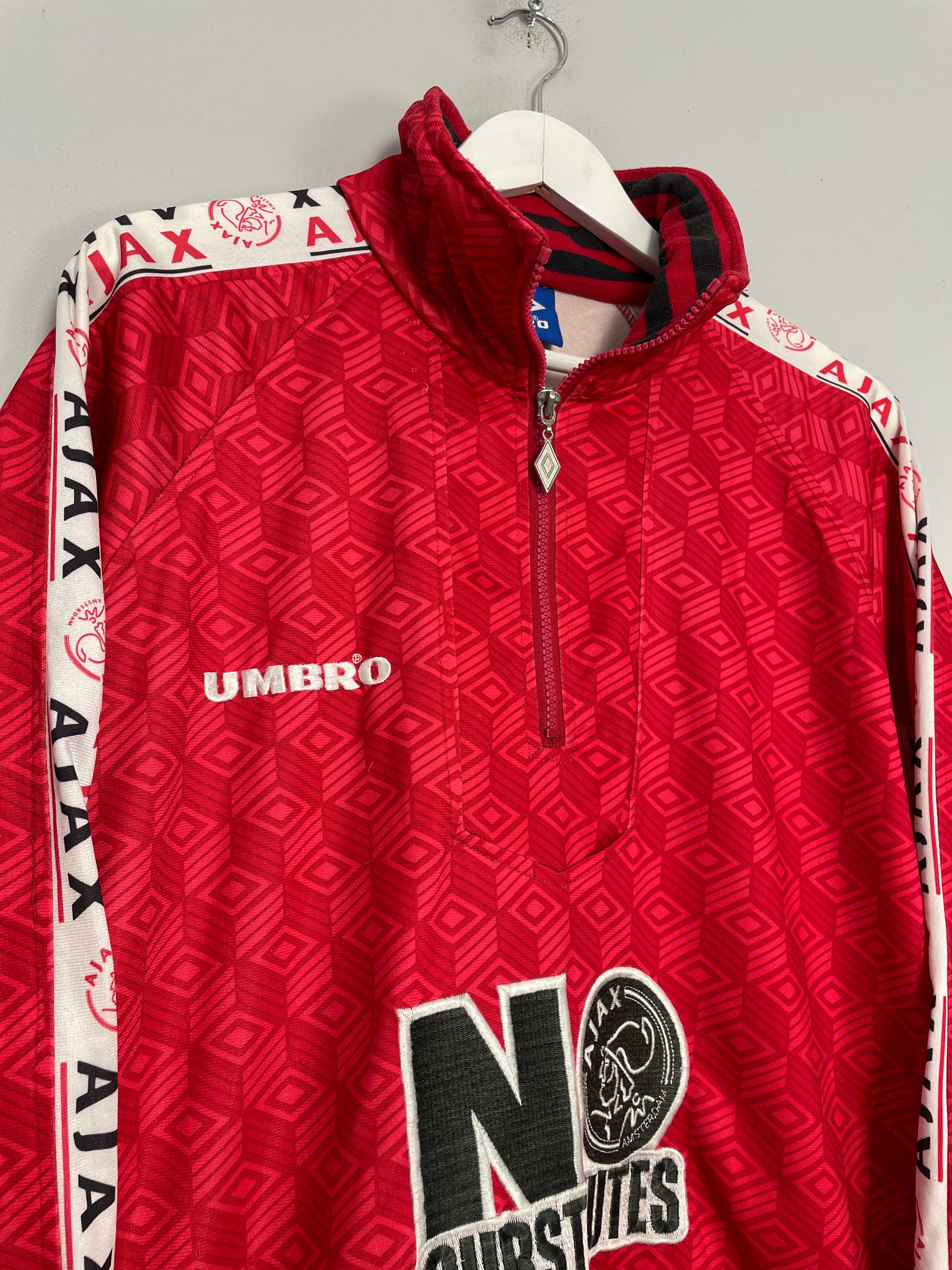 Shop 1994/95 AJAX 1/4 ZIP JACKET (XXL) UMBRO, classic football shirts, vintage football shirts & retro soccer jerseys at Cult Kits