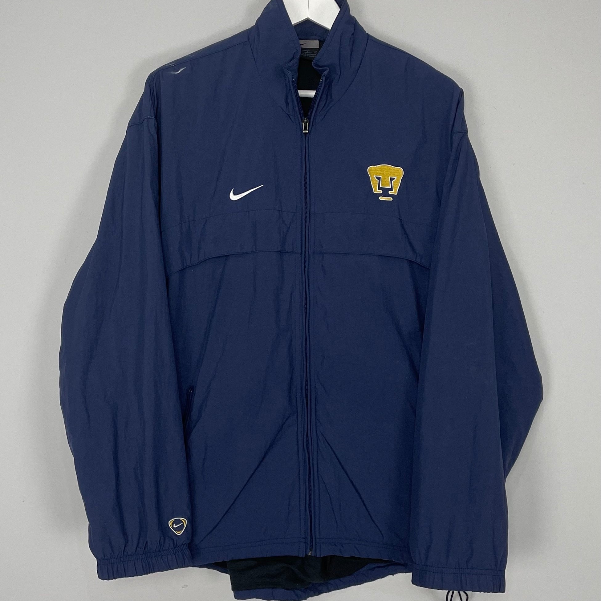 Shop 2001/02 UNAM PUMAS TRACK JACKET (L) NIKE, classic football shirts, vintage football shirts & retro soccer jerseys at Cult Kits