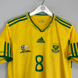 Shop 2010 SOUTH AFRICA TSHABALALA #8 HOME SHIRT (XL) ADIDAS, classic football shirts, vintage football shirts & retro soccer jerseys at Cult Kits