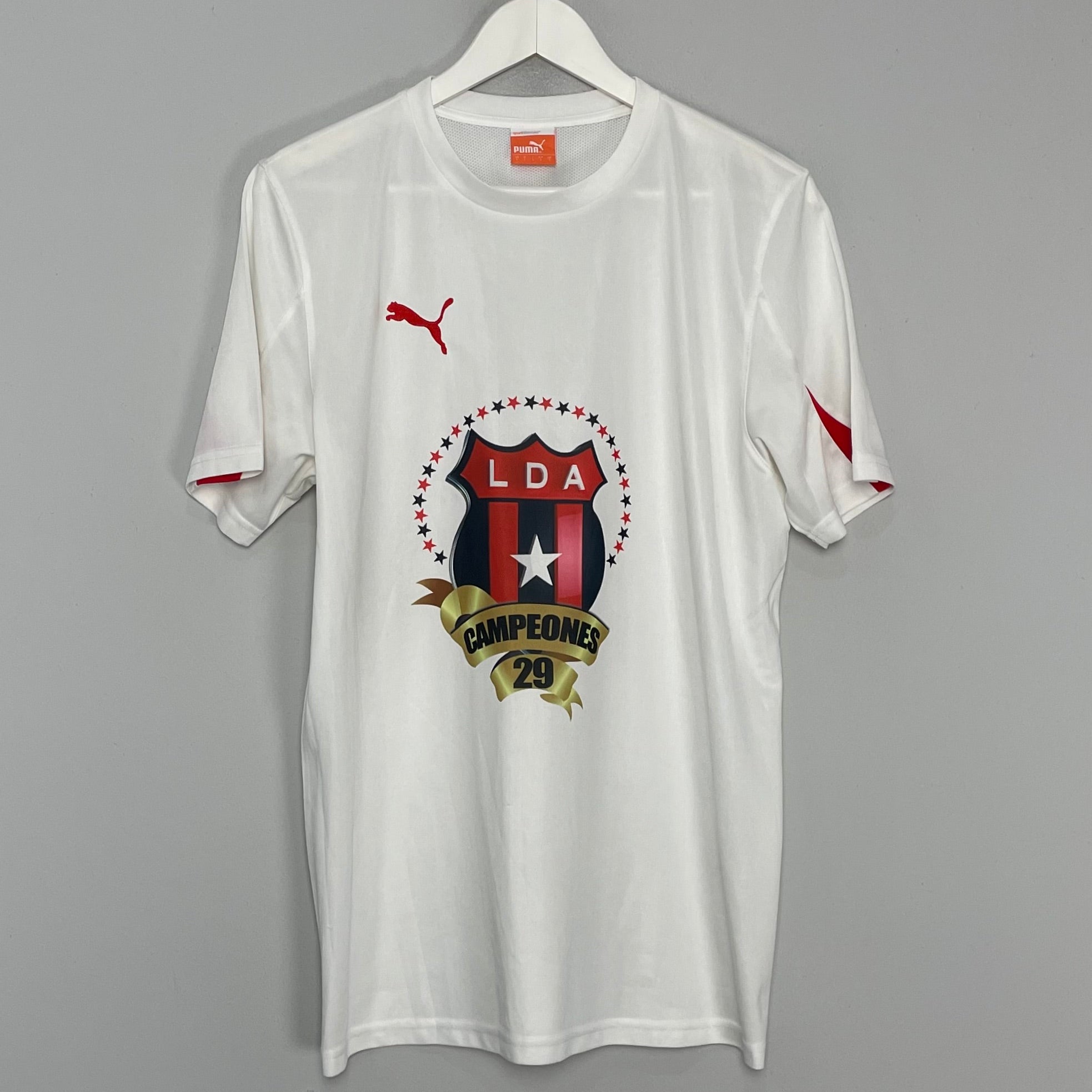 Shop 2009 LIGA DEPORTIVA ALAJUELENSE 'CHAMPIONS' T-SHIRT (L) PUMA, classic football shirts, vintage football shirts & retro soccer jerseys at Cult Kits