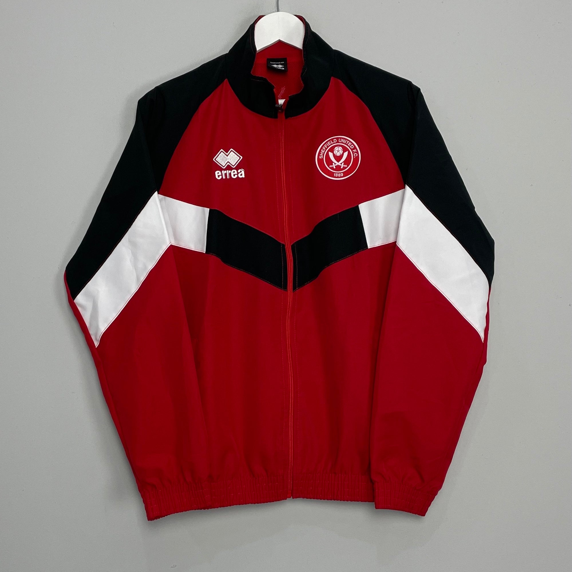 Shop 2023/24 SHEFFIELD UNITED TRACK JACKET (M) ERREA, classic football shirts, vintage football shirts & retro soccer jerseys at Cult Kits