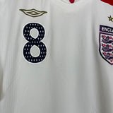 2007/09 England Frank Lampard #8 home shirt by Umbro, XL size, featuring faint spot and badge fade, in very good condition.