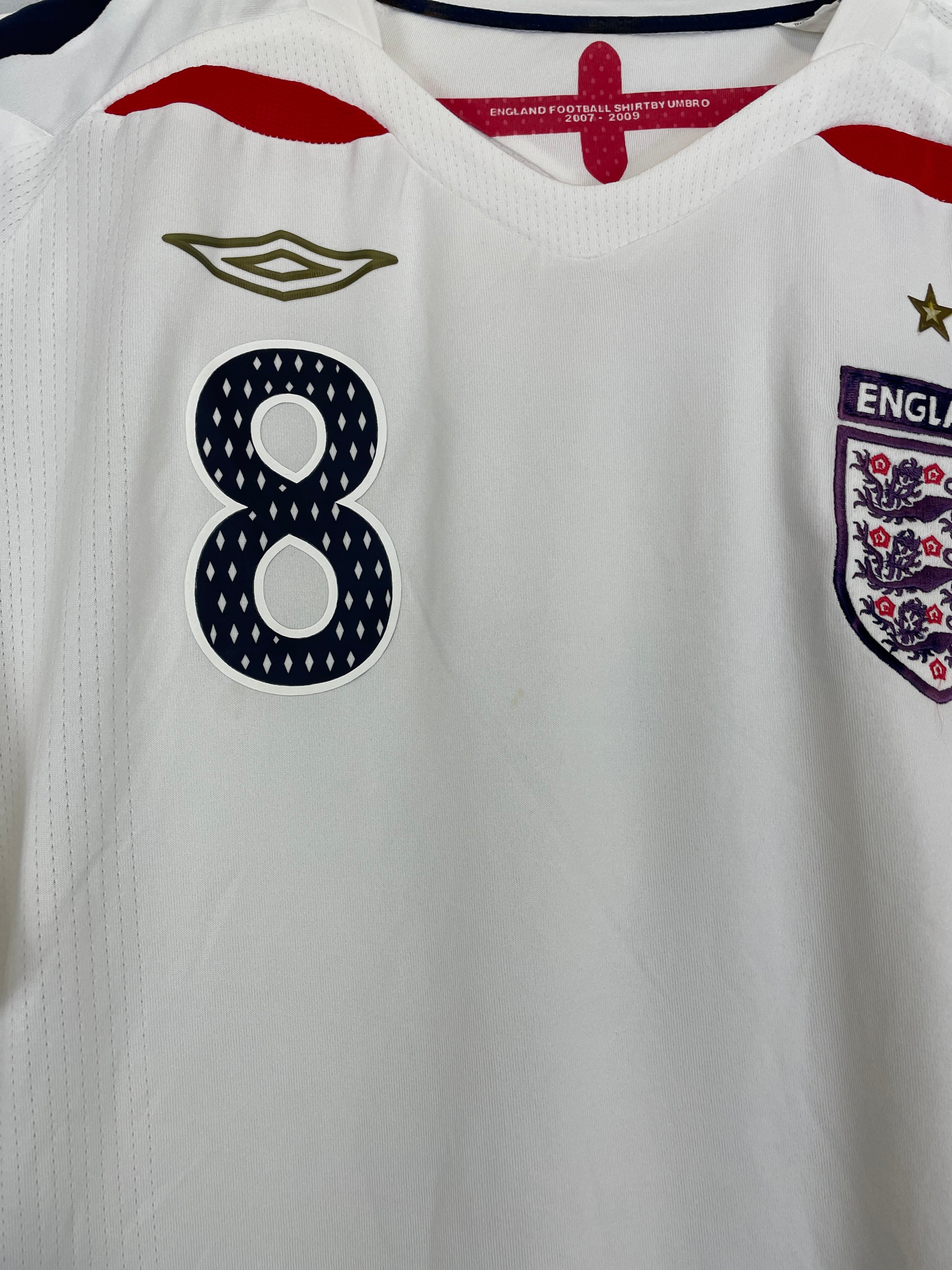 2007/09 England Frank Lampard #8 home shirt by Umbro, XL size, featuring faint spot and badge fade, in very good condition.