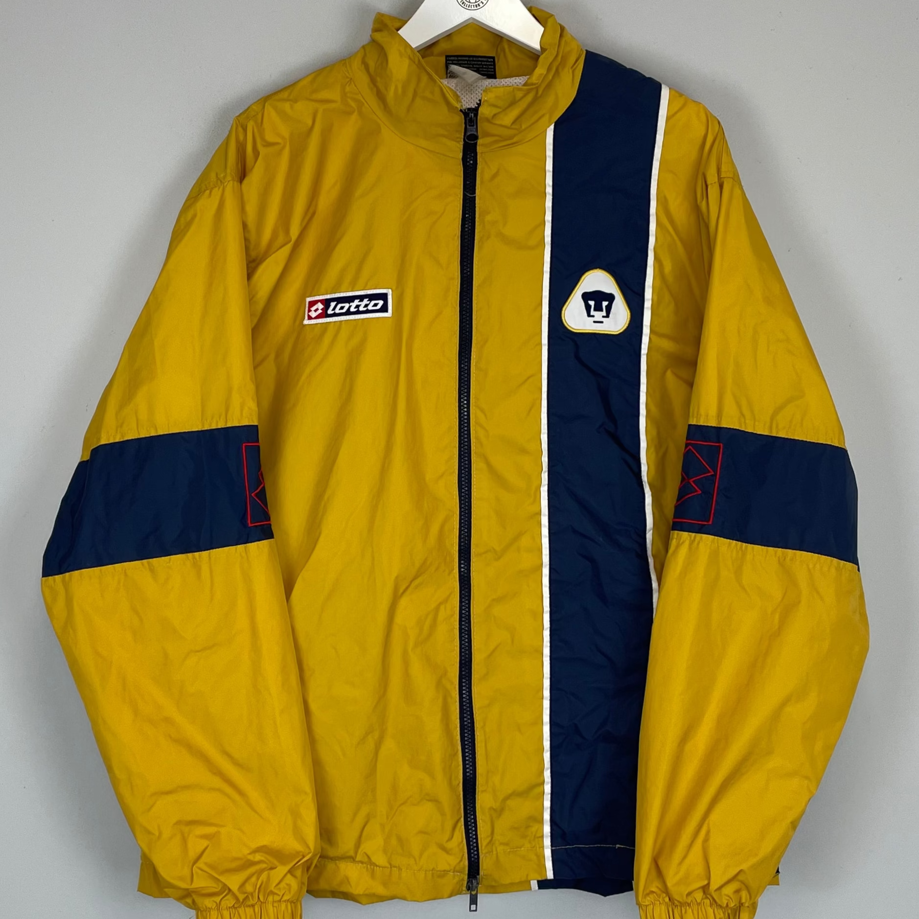 Buy 2006/07 UNAM PUMAS TRACK JACKET (L) LOTTO ~ Free worldwide shipping available ~ Authentic Vintage Football Shirts from Cult Kits