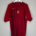 Shop 2004/05 MANCHESTER UNITED TRAINING SHIRT (XXL) NIKE, classic football shirts, vintage football shirts & retro soccer jerseys at Cult Kits