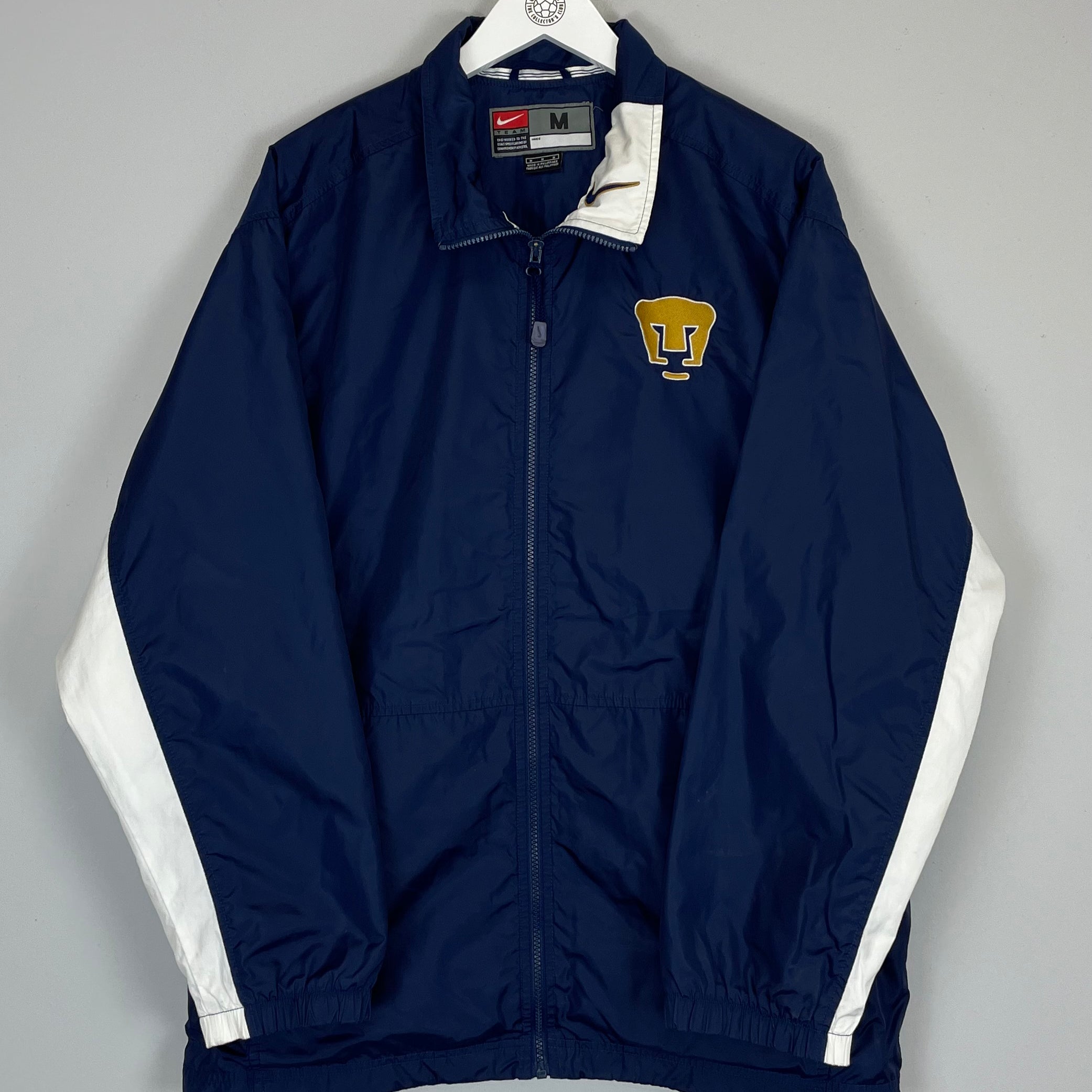Shop 2001/02 UNAM PUMAS TRACK JACKET (M) NIKE, classic football shirts, vintage football shirts & retro soccer jerseys at Cult Kits