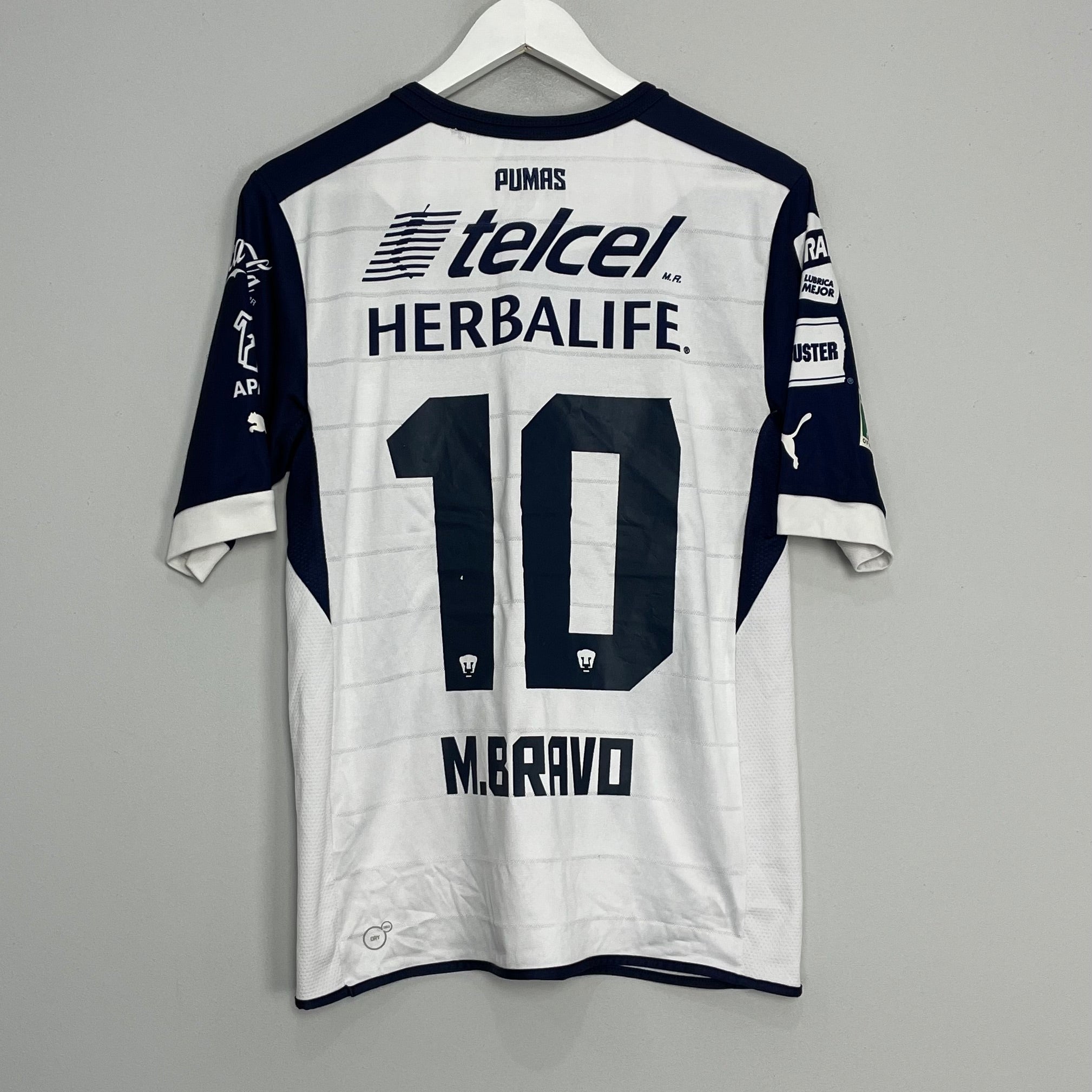 Shop 2012/13 UNAM PUMAS M.BRAVO #10 HOME SHIRT (M) PUMA, classic football shirts, vintage football shirts & retro soccer jerseys at Cult Kits