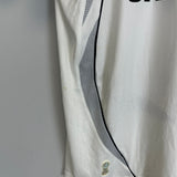 2006/07 Real Madrid Ronaldo #9 home shirt side view, showing vintage design and minor condition spots.