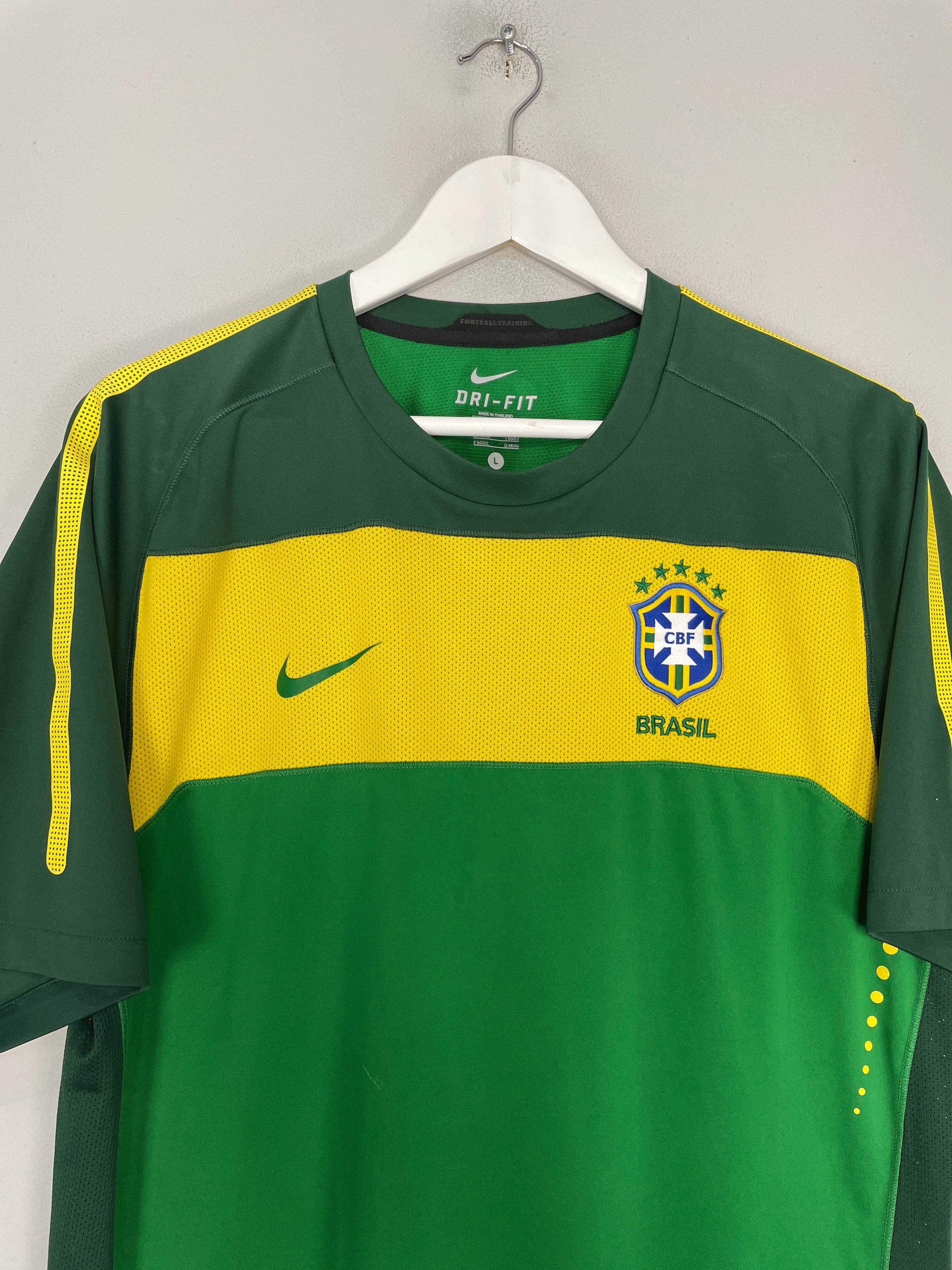 Shop 2010/11 BRAZIL TRAINING SHIRT (L) NIKE, classic football shirts, vintage football shirts & retro soccer jerseys at Cult Kits
