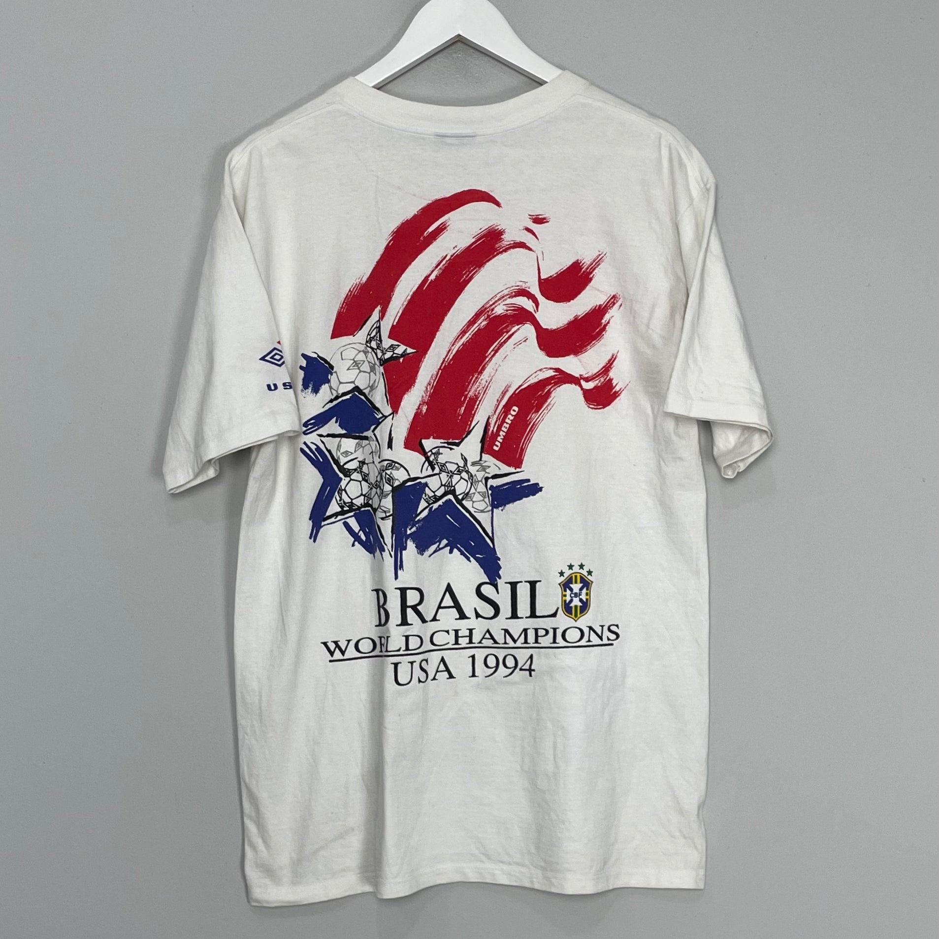 Shop 1994 USA WORLD CUP BRAZIL CHAMPIONS T-SHIRT (L) UMBRO, classic football shirts, vintage football shirts & retro soccer jerseys at Cult Kits