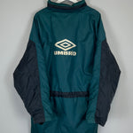 1992/93 Ajax bench coat by Umbro in XL, featuring a green and black design with Umbro logo on the back.
