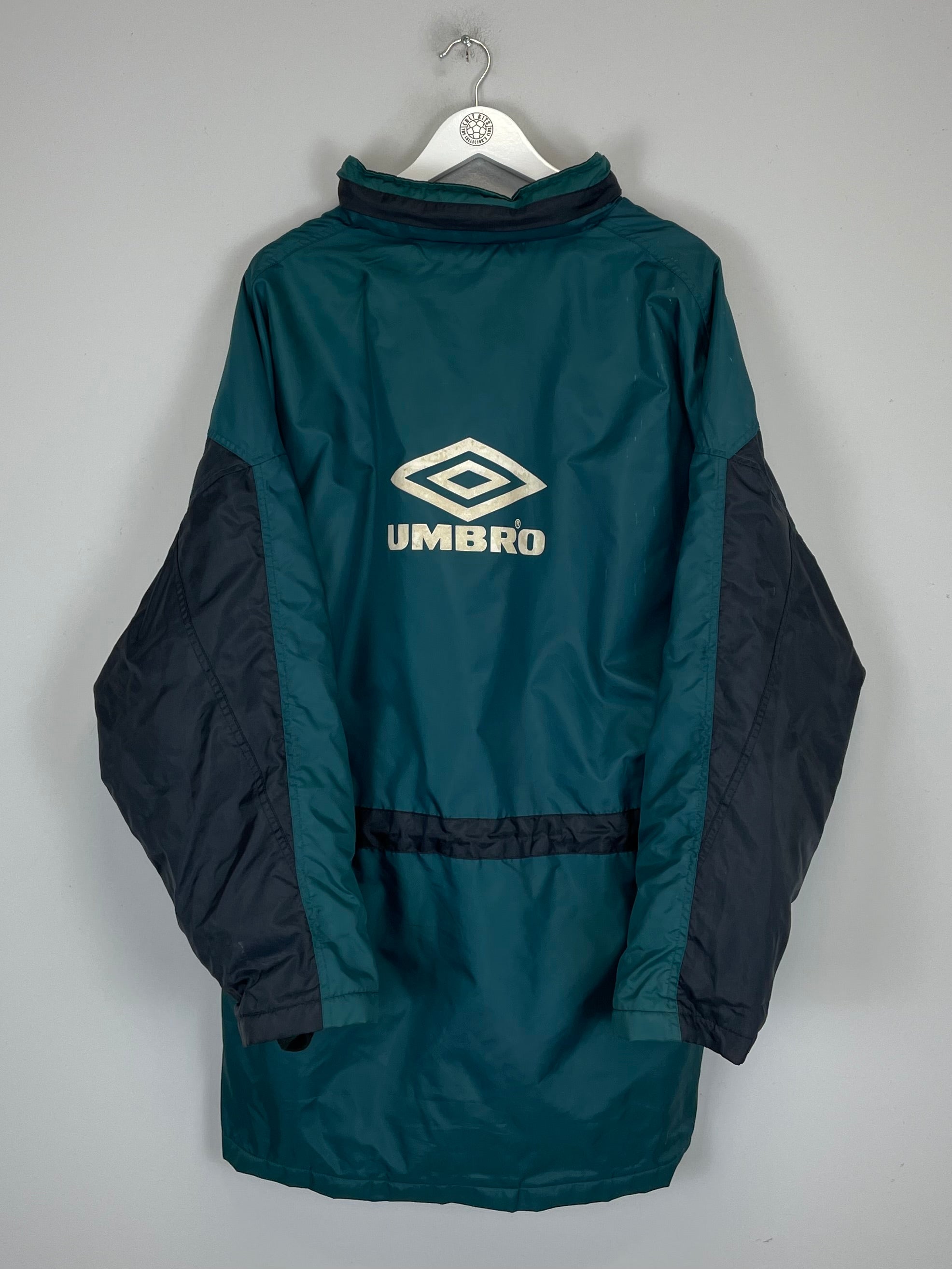 1992/93 Ajax bench coat by Umbro in XL, featuring a green and black design with Umbro logo on the back.