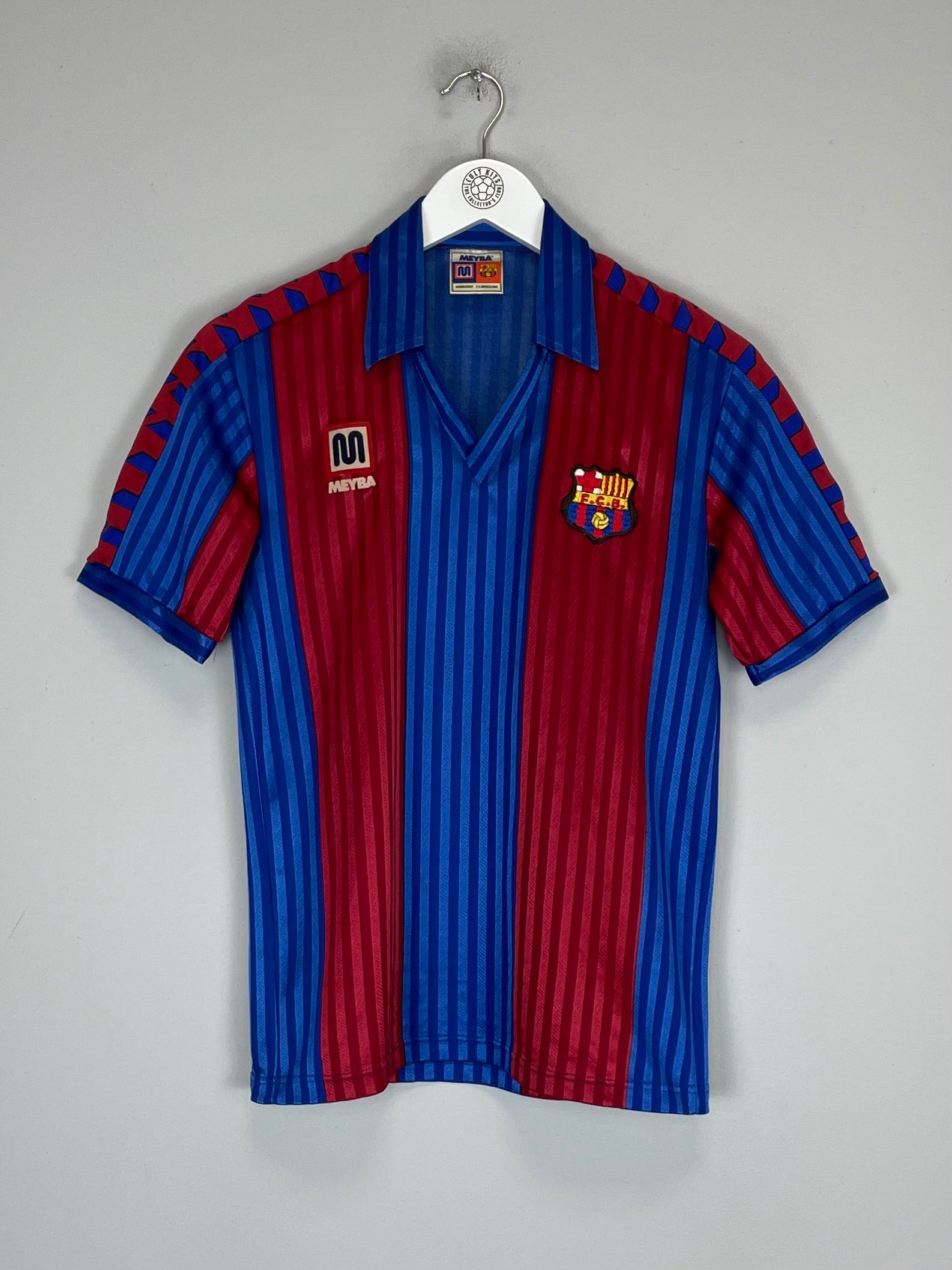 1984/89 Barcelona Home Shirt by Meyba in excellent condition, small size, featuring iconic red and blue stripes.