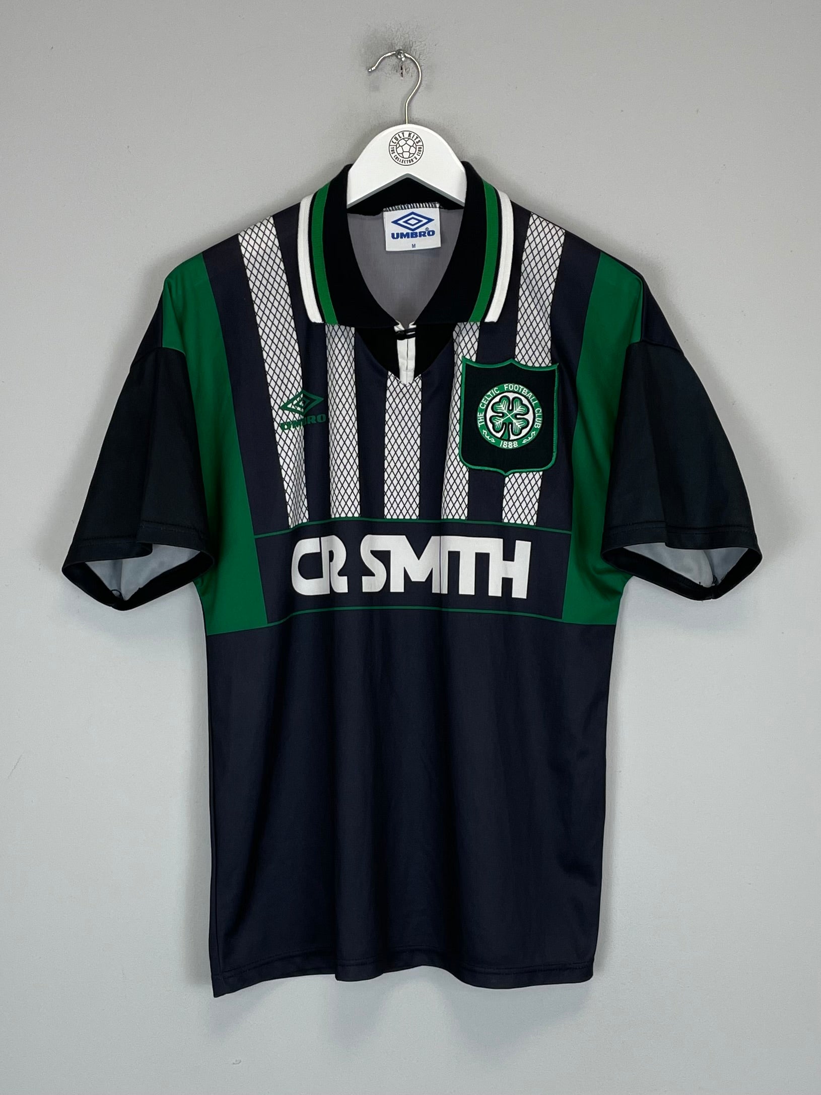1994/95 Celtic away shirt in excellent condition, size medium, made by Umbro, featuring team logo and unique design.