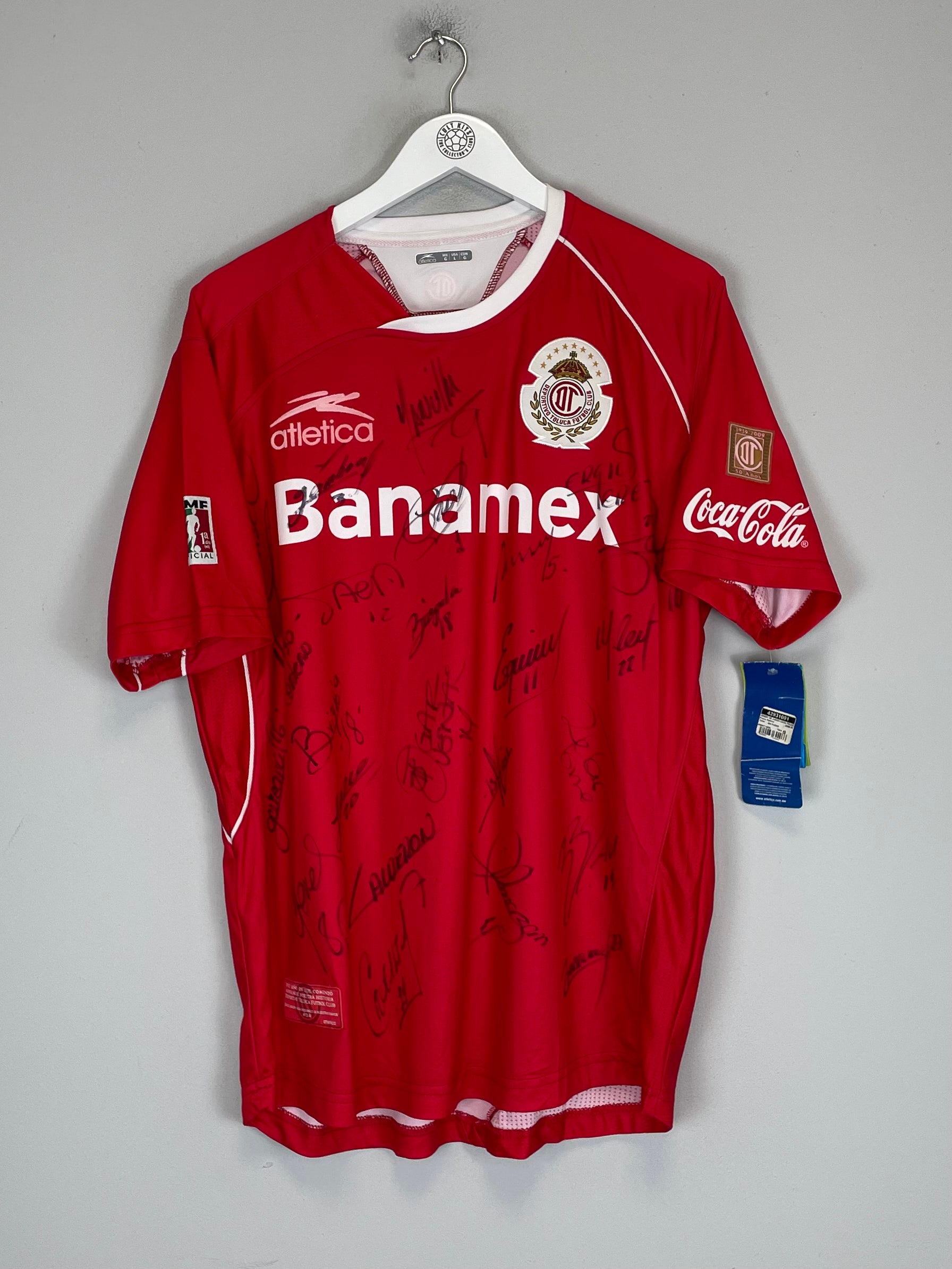 Shop 2009/10 TOLUCA *SQUAD SIGNED* BNWT HOME SHIRT (L) ATLETICA, classic football shirts, vintage football shirts & retro soccer jerseys at Cult Kits