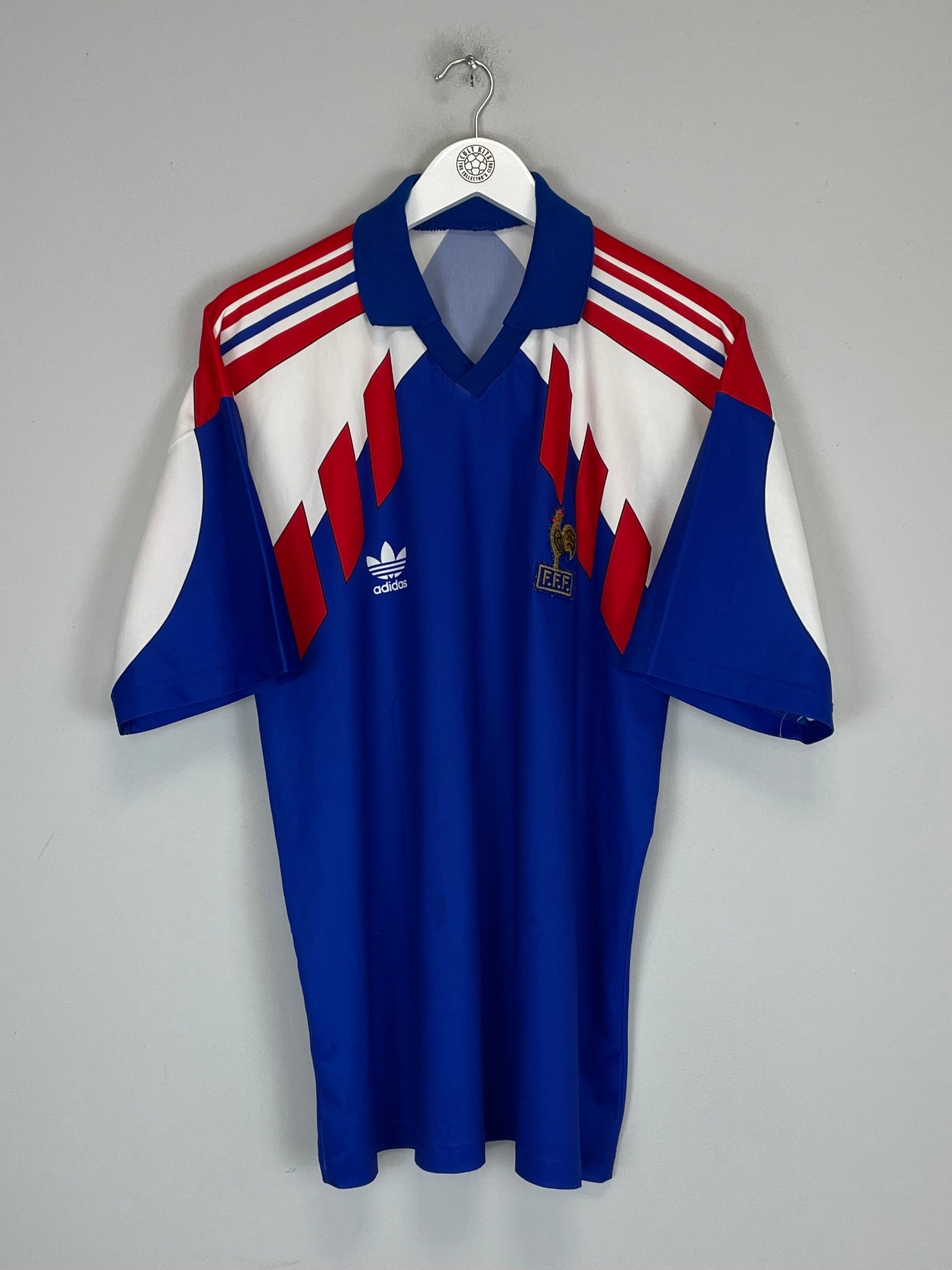 1990/92 France home shirt by Adidas in excellent condition, size large, featuring iconic blue and red design.