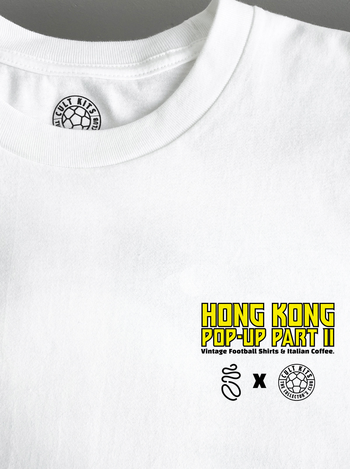 Shop BRUCE LEE HONG KONG POP-UP GRAPHIC TEE, classic football shirts, vintage football shirts & retro soccer jerseys at Cult Kits