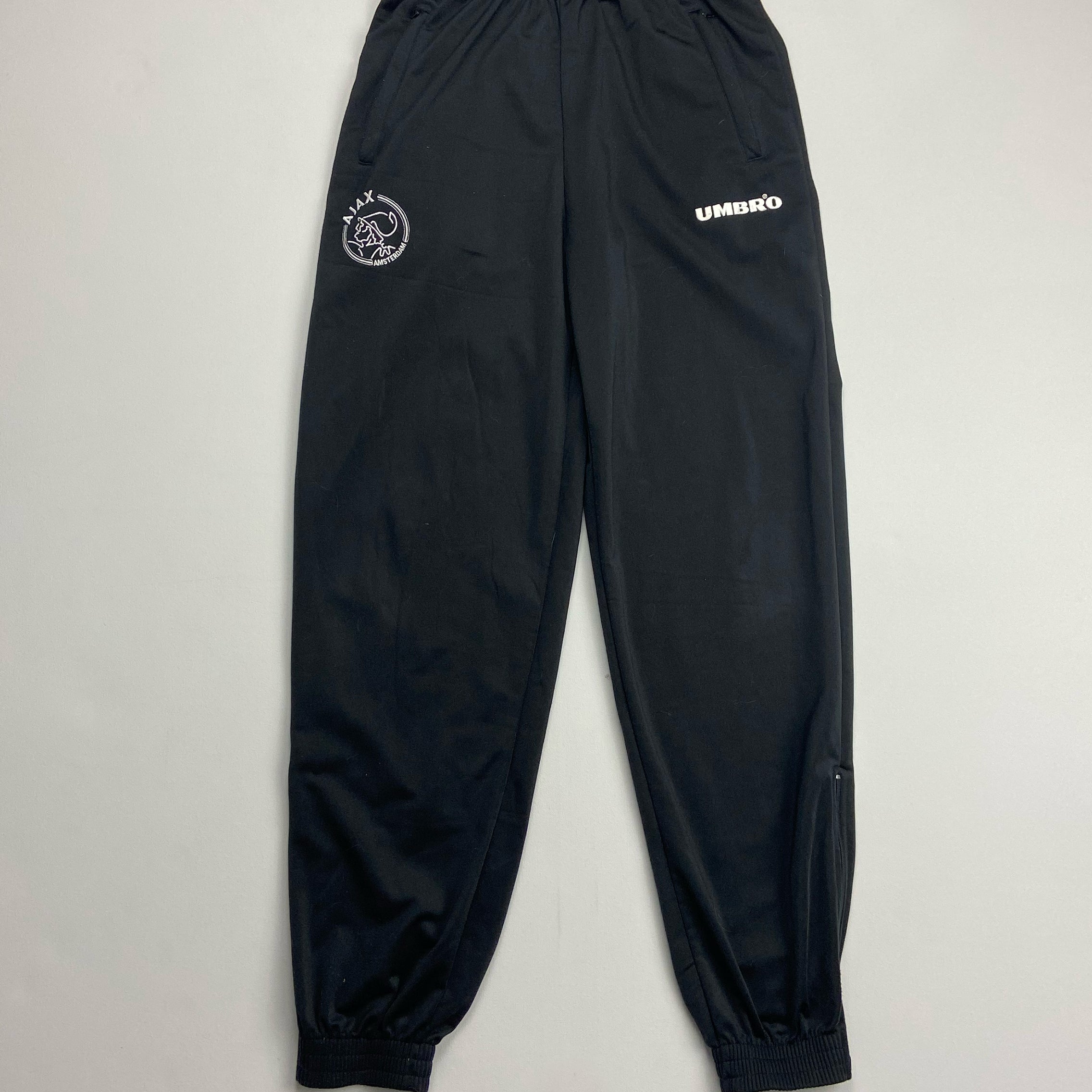 Shop 1999/00 AJAX TRACKSUIT BOTTOMS (S) UMBRO, classic football shirts, vintage football shirts & retro soccer jerseys at Cult Kits