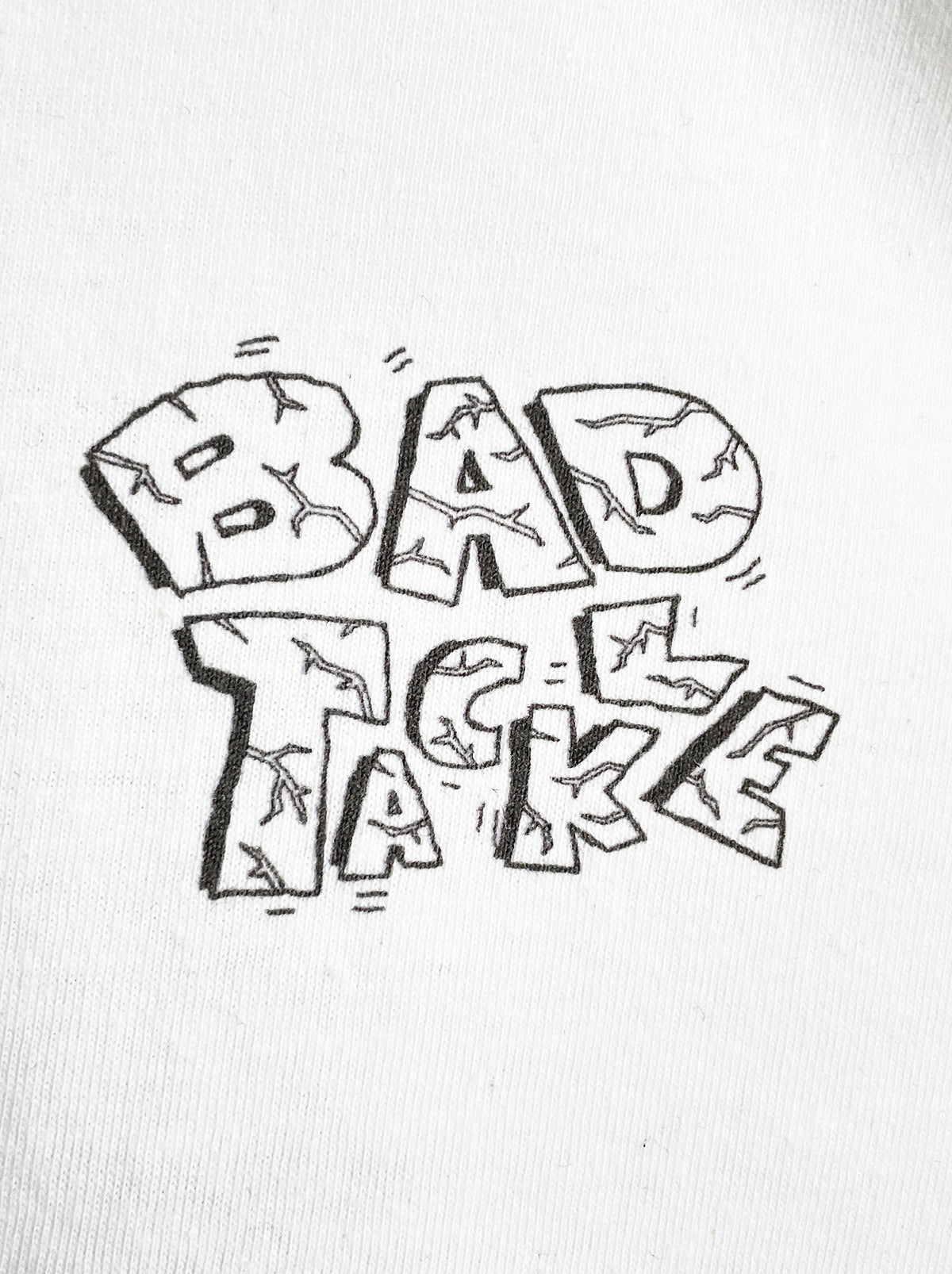 BAD TACKLE TEE